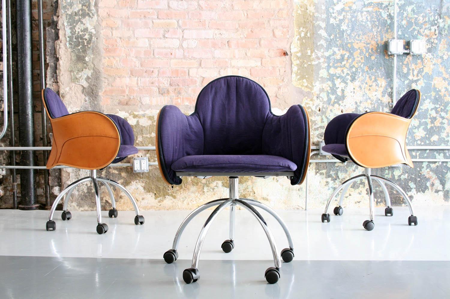 Designed in 1992 by Vico Magistretti for De Padova, Italy. The Incisa swivel chair is the ideal seat for the corporate office and meeting room, but also for the desk of home. The chair is distinguished by its external seat leather upholstery, shaped