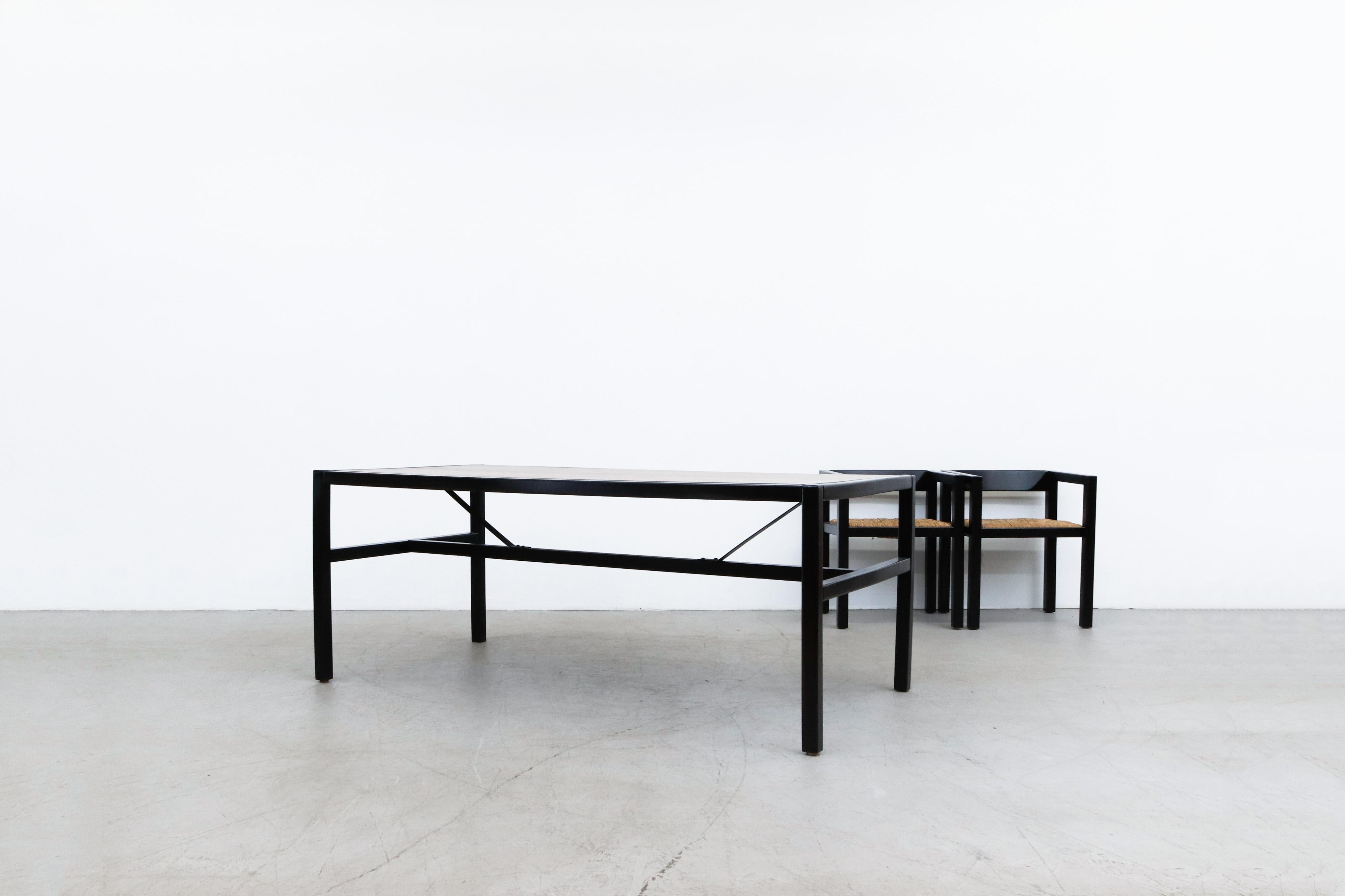 Vico Magistretti Inspired Modernist Two Tone dining set with 6 cube chairs. Wenge table with stained black wood trim. Matching set of 6 cube dining chairs with rush seating. Table is 70.5 x 37.25 x 28, chairs measure 21.125 x 17.625 x 17.25/26.125.