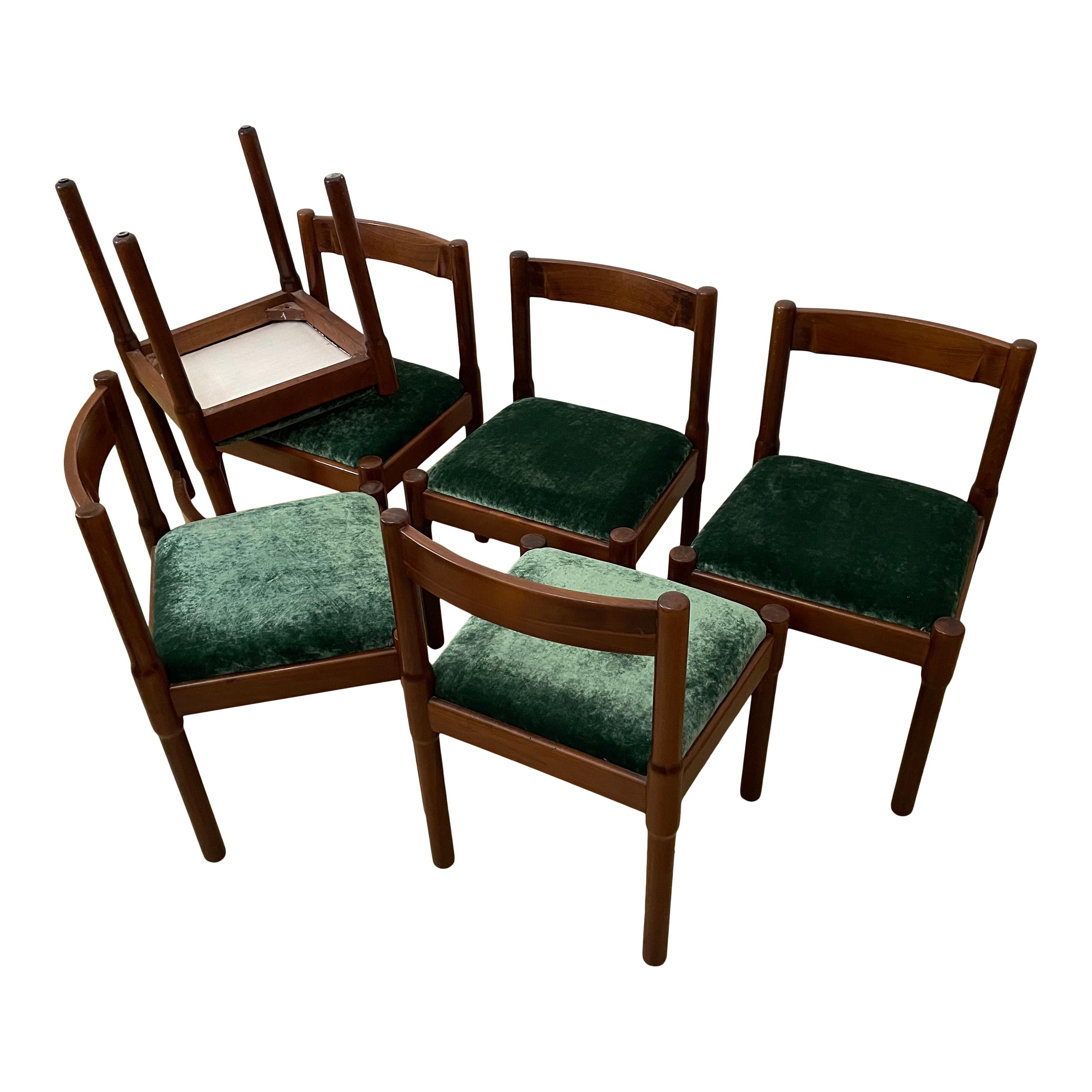  Set of 4 “Carimate” chairs designed by Vico Magistretti and produced by Cassina in 1963.

Initially commissioned for the Carimate Golf club near Milan, they were then produced for the public by Cassina.

Structure in brown beechwood, seating in