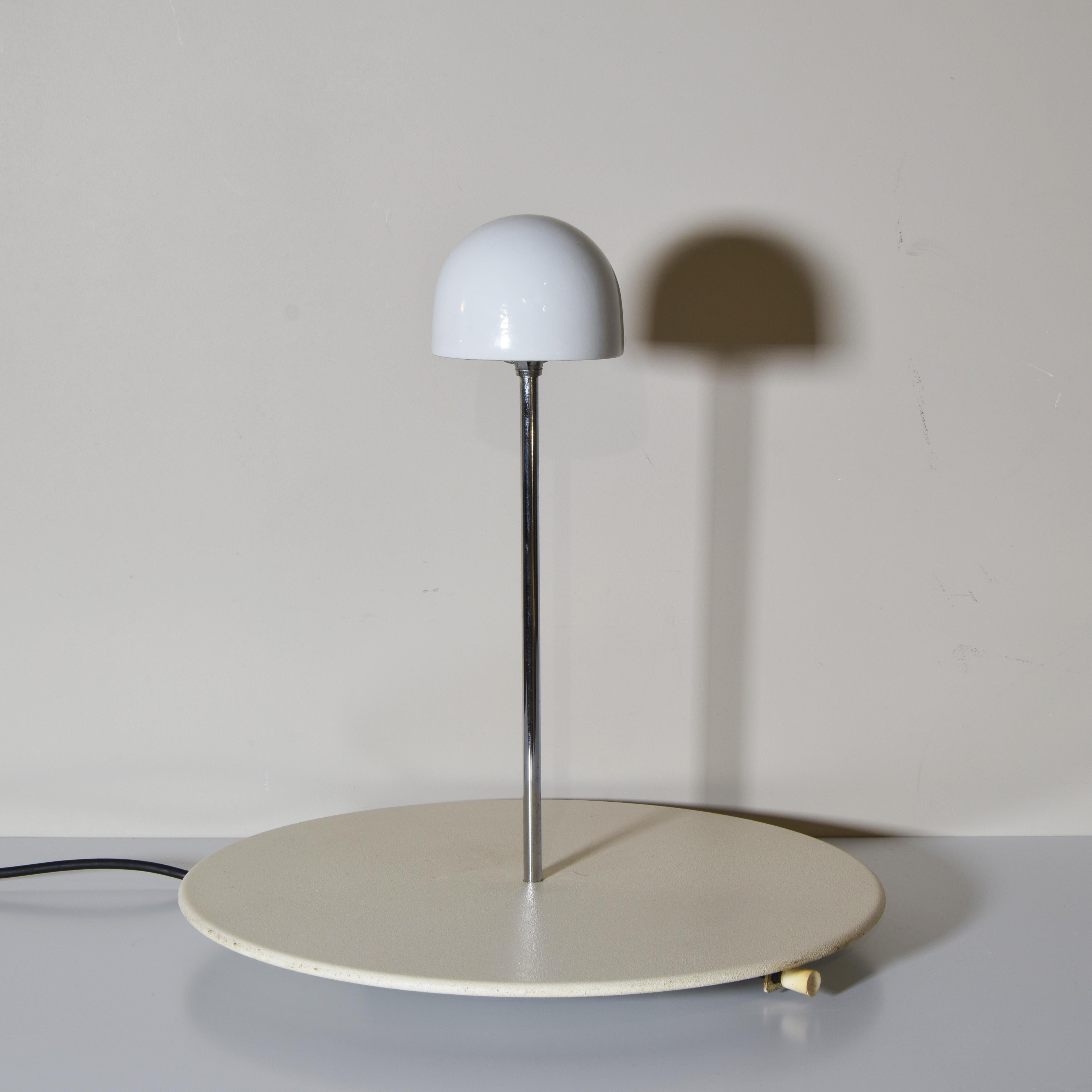 Nemea table lamp designed by Vico Magistretti for Artemide production 1970s.
It is known for its elegant and functional style, typical of Magistretti’s creations. The lamp has a simple yet refined design, perfect for adding a touch of class to any