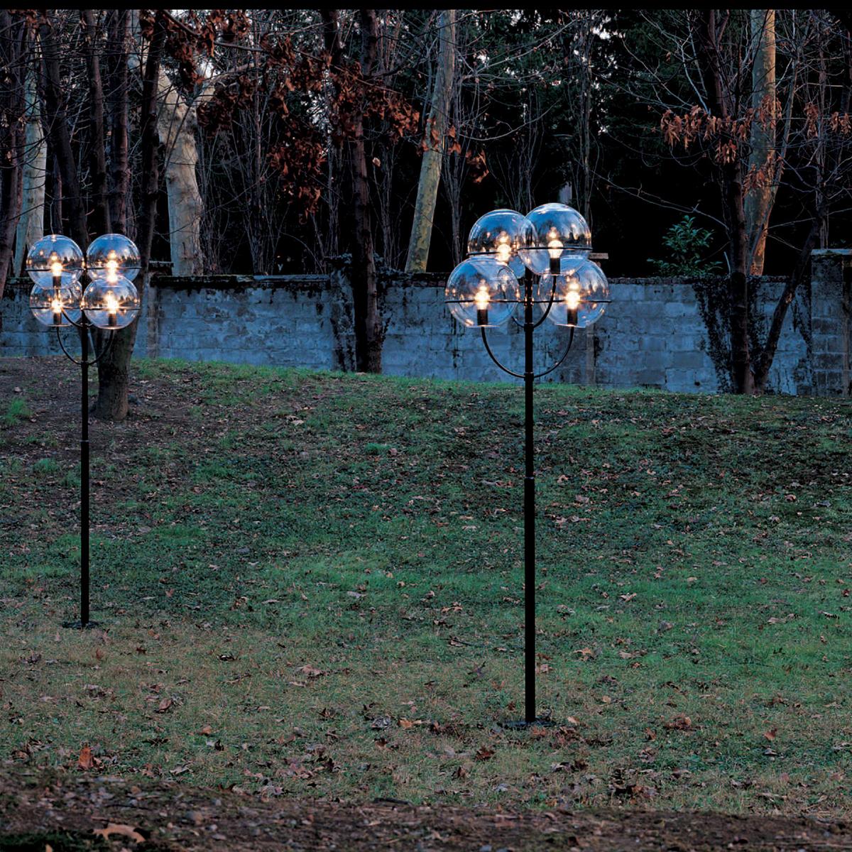 Outdoor lamp 'Lyndon 350 M' designed by Vico Magistretti in 1977. Outside floor lamp. Zinc-plated black lacquered metal structure, globes in transparent polycarbonate. Manufactured by Oluce, Italy.

Lyndon is a project by Vico Magistretti created