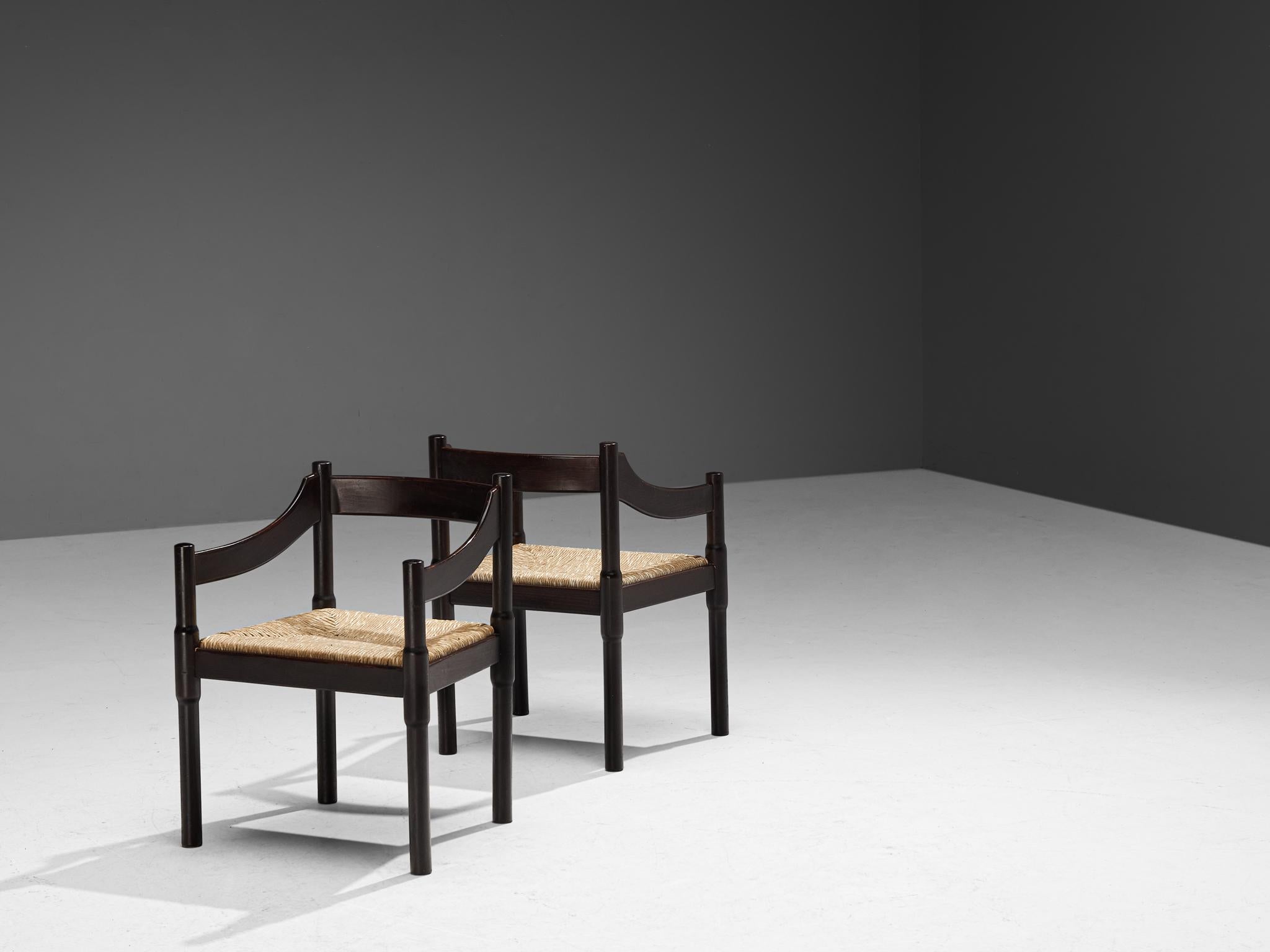 Vico Magistretti, pair of ‘Carimate’ armchairs, model '892', stained beech, rush, Italy, design 1963

The ‘Carimate’ chair is one of Vico Magistretti’s most famous chairs. Originally designed in a red color for the ‘Carimate Golf Club’ in Italy