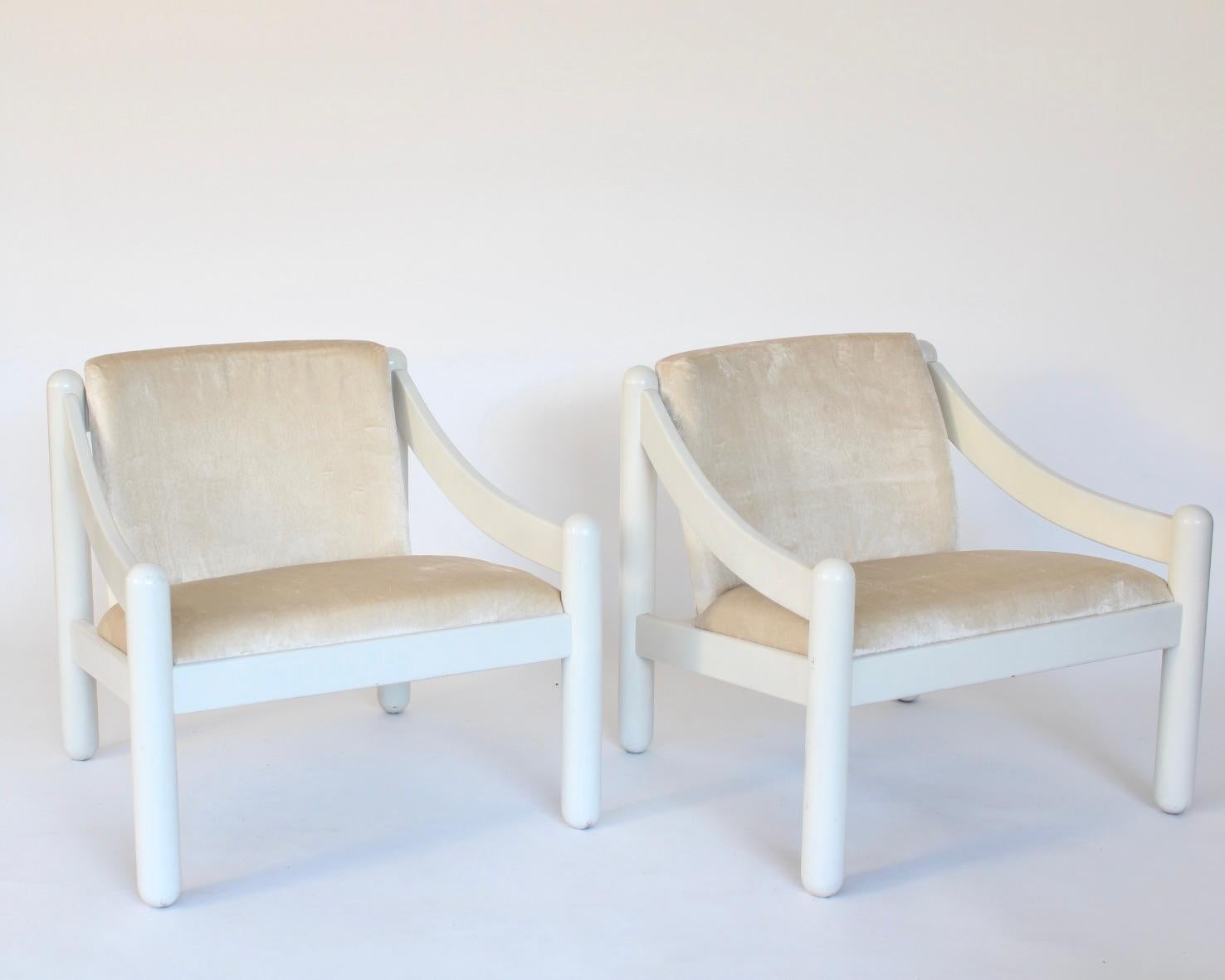 Vico Magistretti for Cassina, pair of the Carimate lounge chairs, in a rare white lacquered beech wood with new warm tone cream velvet, Italy, designed circa 1960  The Carimate lounge chair is one of Vico Magistretti’s most famous chairs.