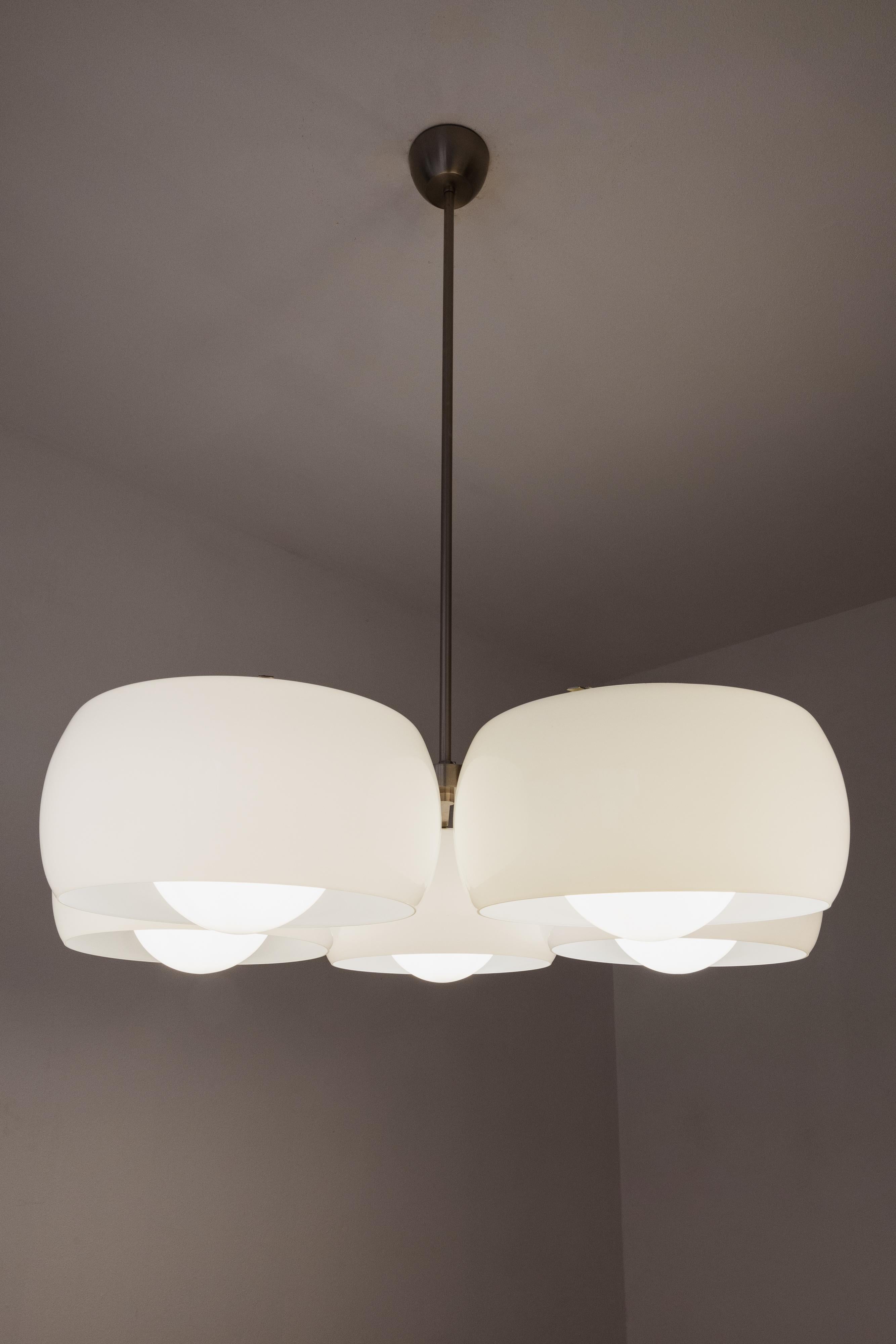 Vico Magistretti “Pentaclinio” ceiling lamps for Artemide, steel and glass, Italy, 1967, set of two.

Vico Magistretti designed the 