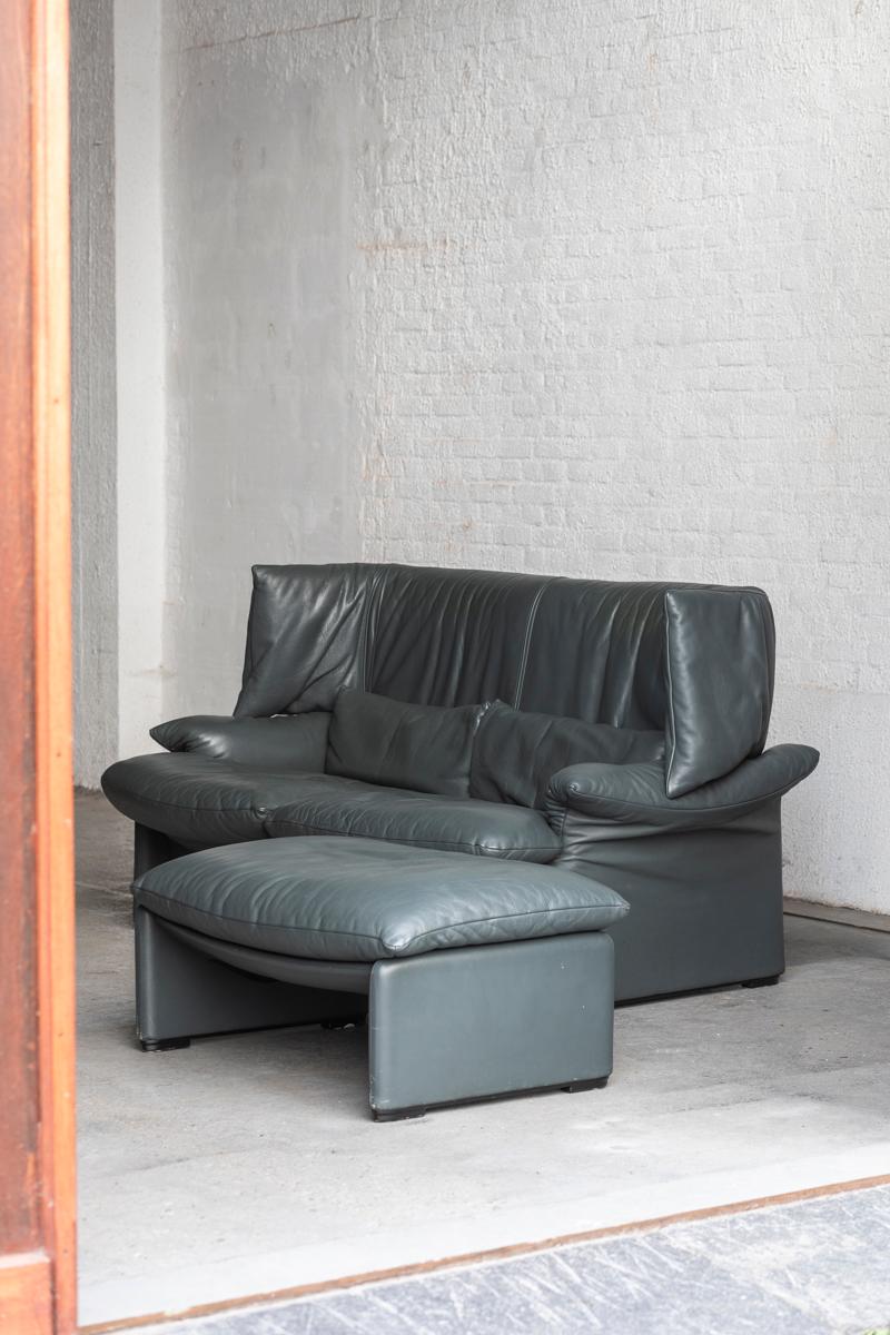 2-Seater sofa with ottoman, model Portovenere, designed by Vico Magistretti and produced by Cassina in Italy around 1989. The sofa has a cold-foamed polyurethane steel frame covered with a double layer of polyester padding. It is known for its high