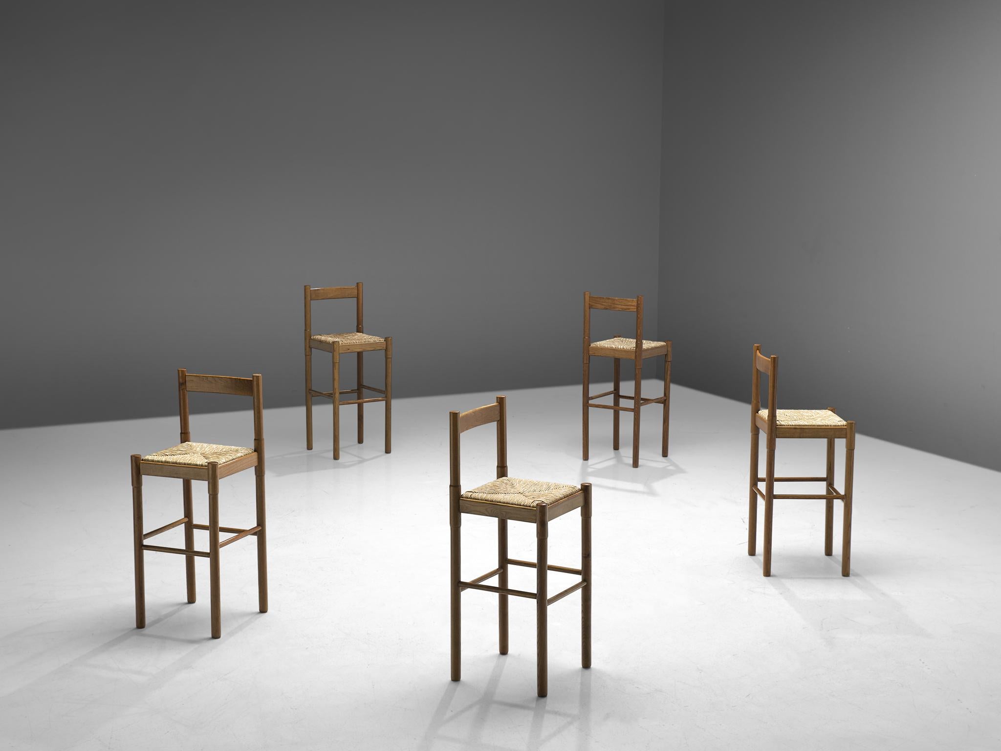 Vico Magistretti, set of 5 barstools, cane and oak, Italy, 1960s

Italian set of five barstools by Vico Magistretti. The stools feature a simplistic, modest design. The frame is made of oak and features straight lines with bold details. The seat