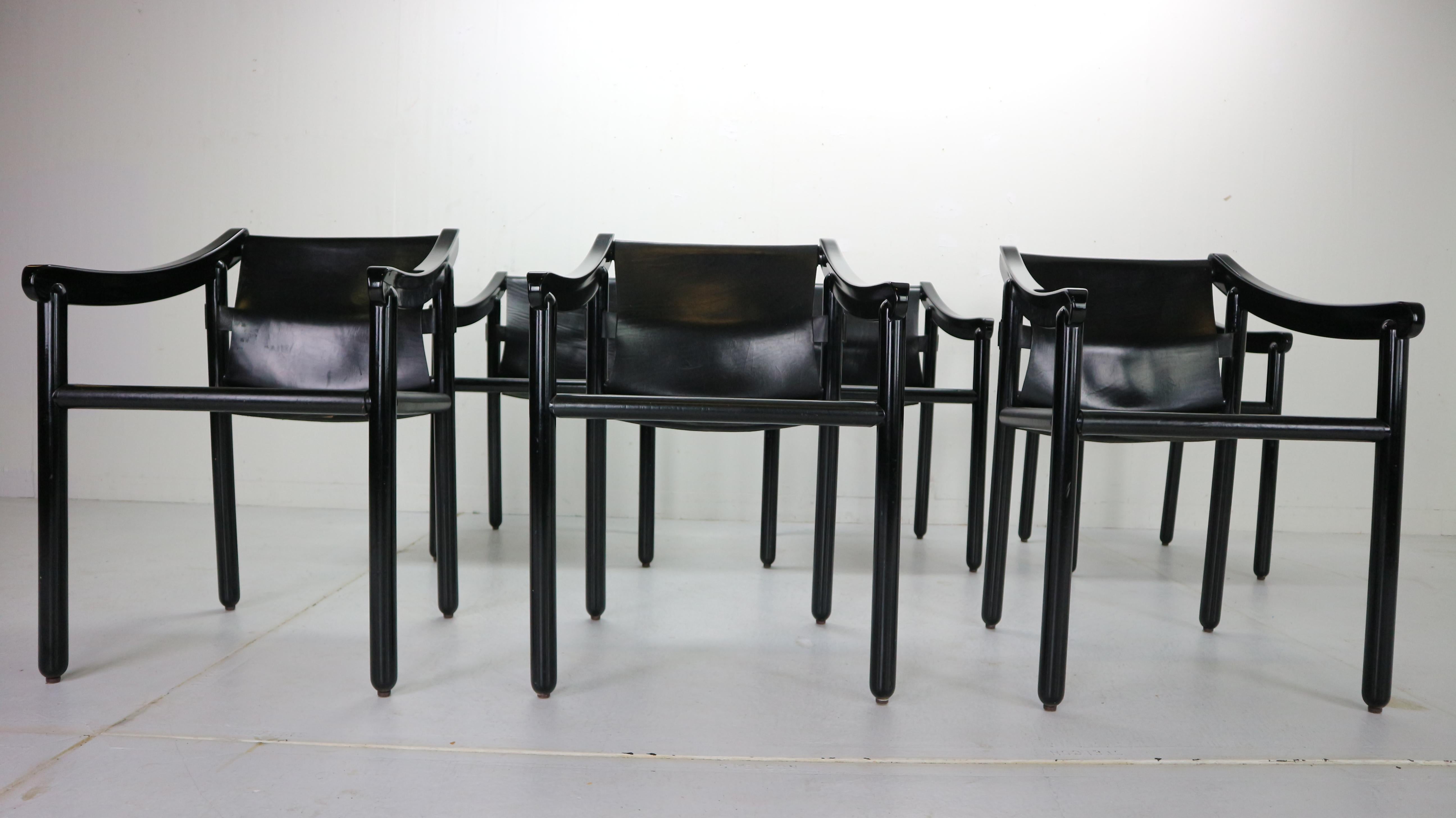 Set of six dining room chairs designed by Vico Magistretti for Cassina manufacture in 1964, Italy. This chairs are the early edition design and still has an original stickers.
Black leather seating and black lacquered wooden frame.
The elegant of