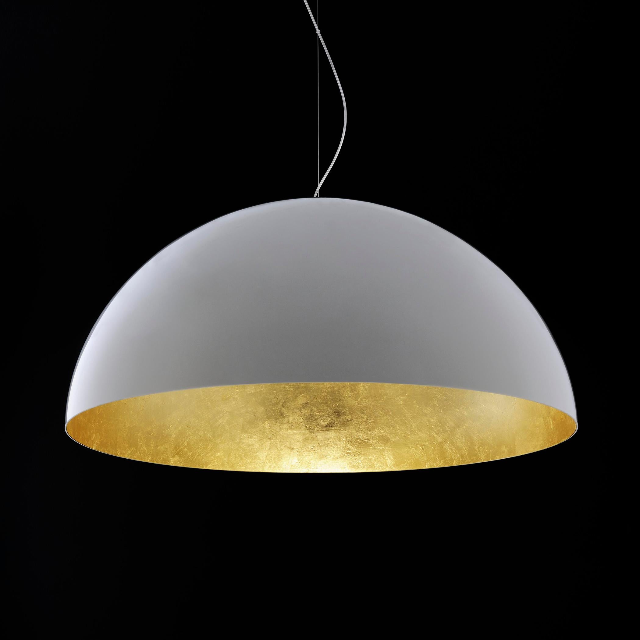 Suspension lamp 'Sonora' designed by Vico Magistretti in 1976.
Suspension lamp, giving direct and diffused light in blown PMMA. Manufactured by Oluce, Italy.

The story of Sonora is one of a pure geometrical shape, pursued by Magistretti