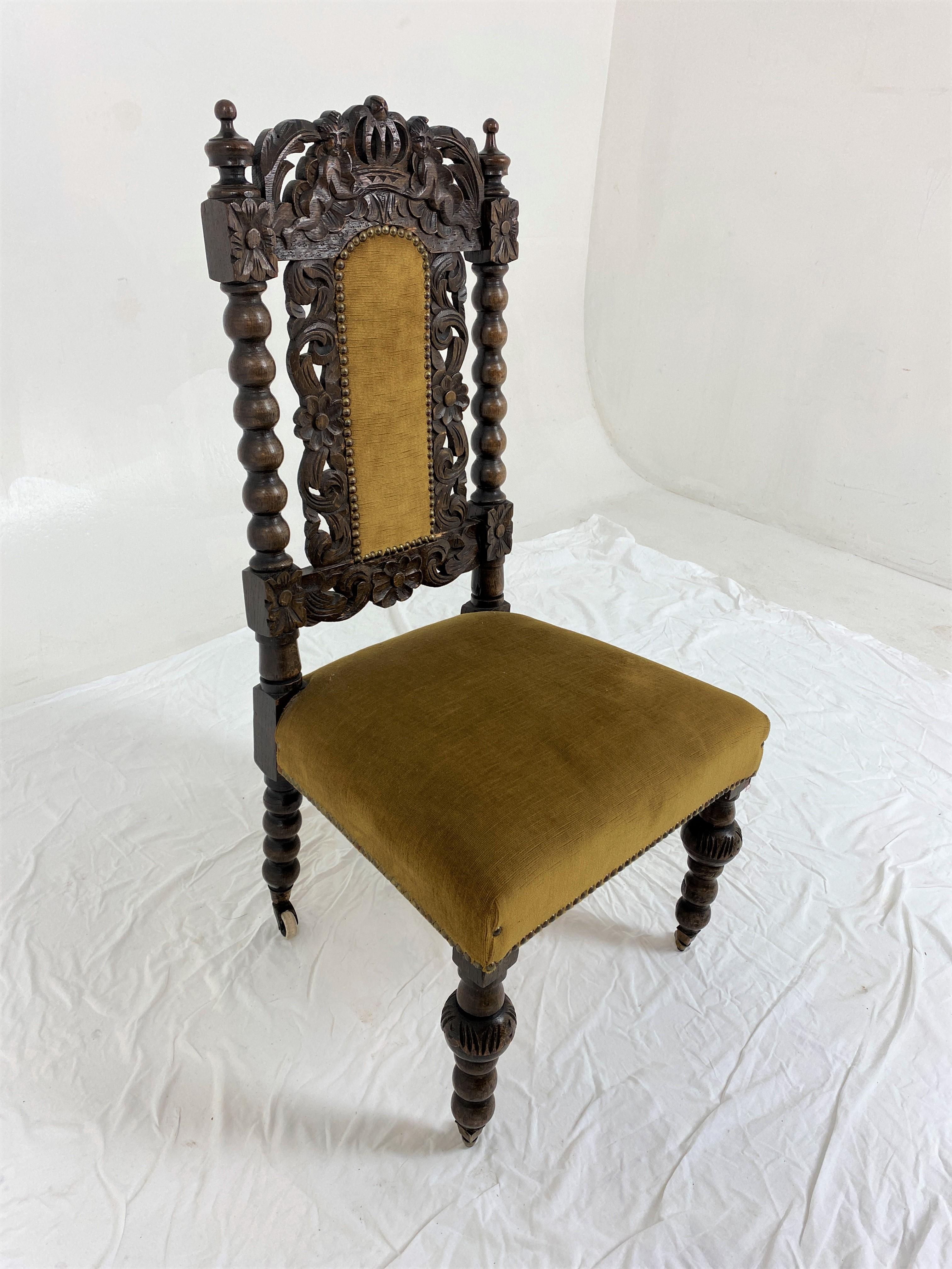 Victorian carved oak Jacobean bobbin upholstered nursing chair, Scotland 1880, H859.

Scotland 1880
Solid Oak
Original Finish pierced top rail
Bobbin supports with finials
Upholstered back and seat
Standing on bulbous carod front legs
With
