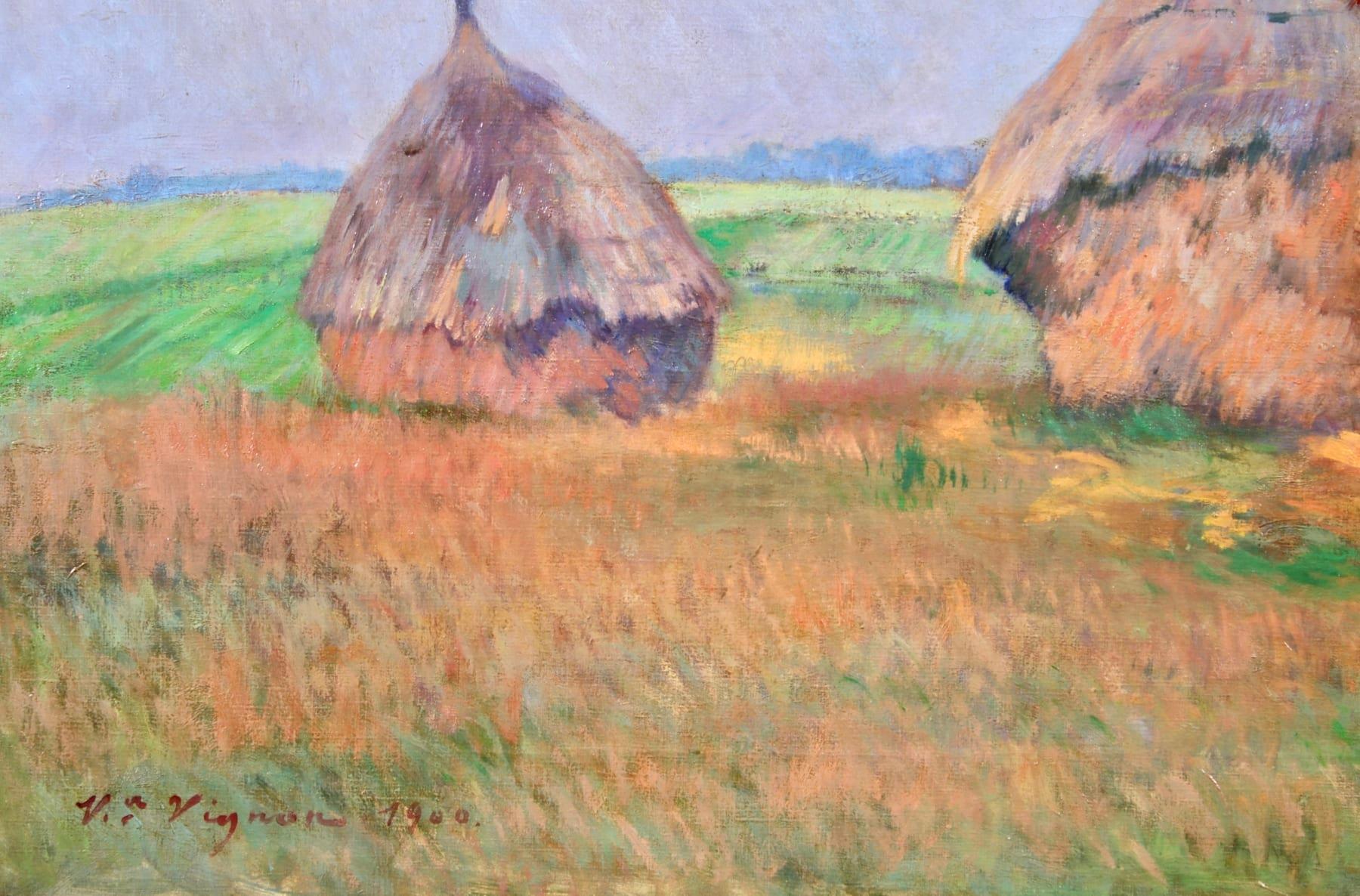 A wonderful oil on canvas circa 1900 by French Impressionist painter Victor Alfred Paul Vignon depicting three haystacks in a green field contrasting against the blue summer sky.

Signature:
Signed and dated 1900 lower left.

Dimensions:
Unframed: