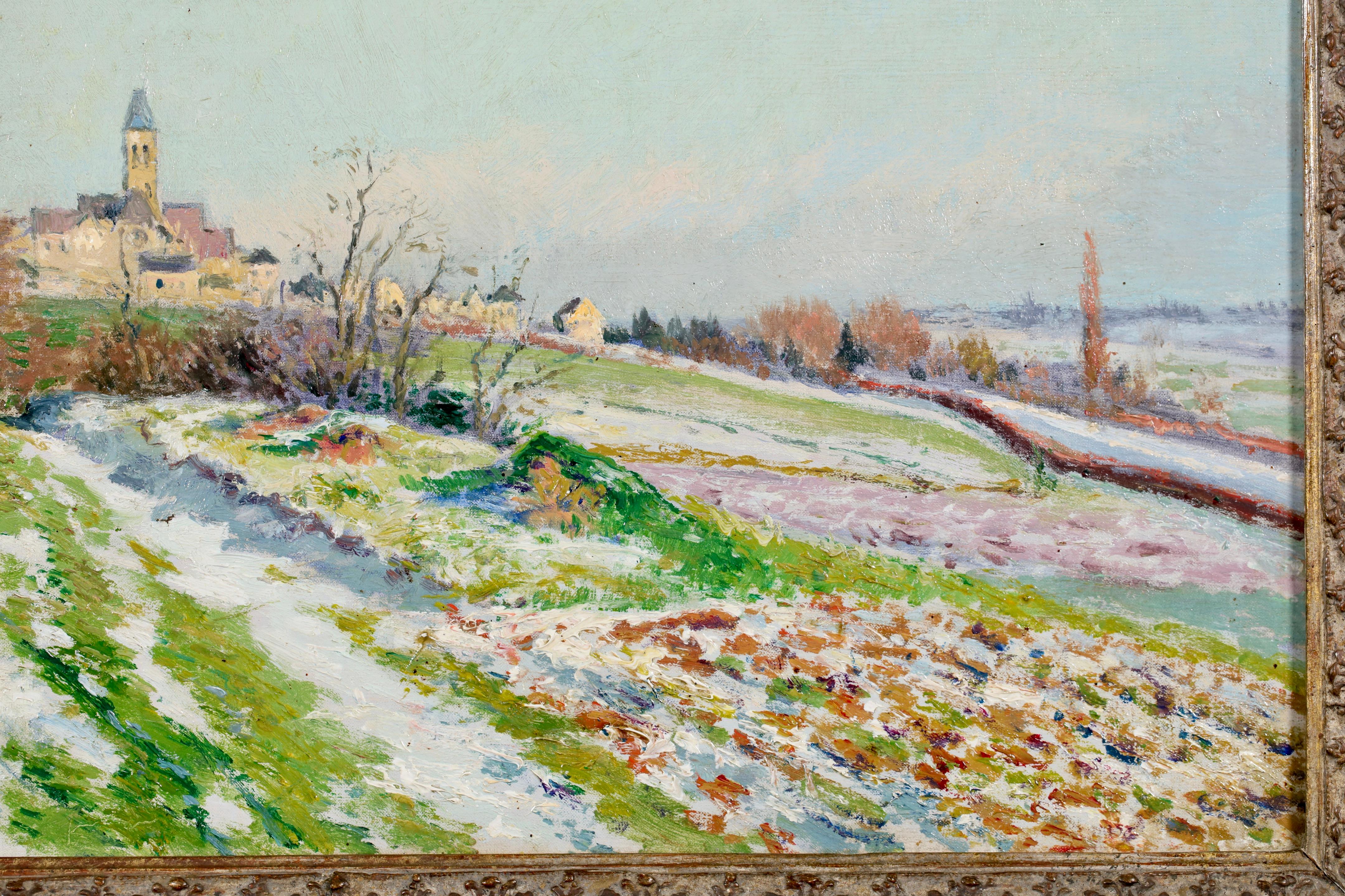 Paysage à l'huile sur toile signé et daté du peintre impressionniste français Victor Alfred Paul Vignon. L'œuvre représente une vue du paysage de l'Oise, un département du nord de la France, en hiver. Il y a de la neige sur le sol qui fond à la