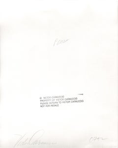 Untitled (Man with Arms Crossed), black and white photograph by Victor Carnuccio