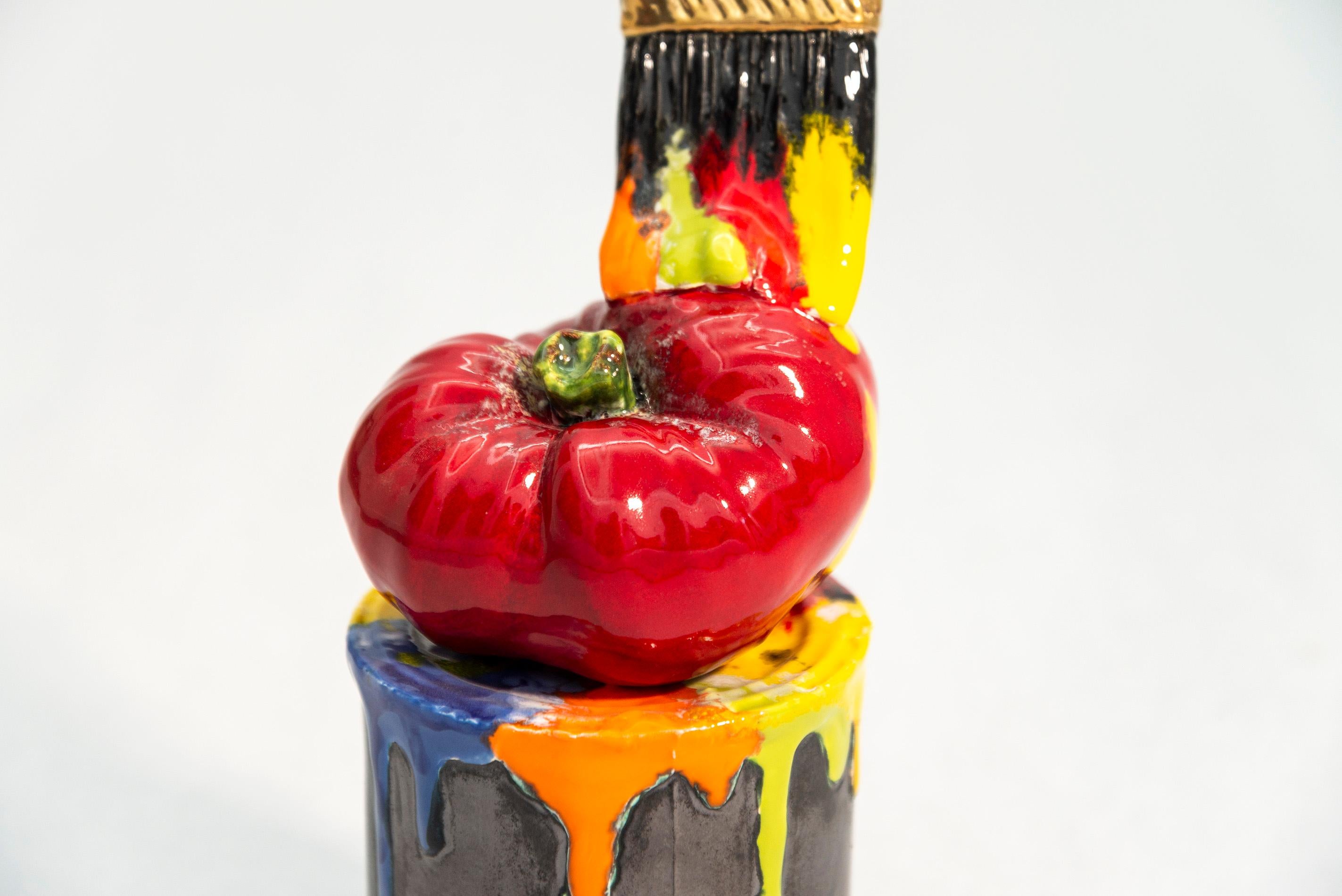 Saskatchewan born sculptor Victor Cicansky creates whimsical, imaginative work rooted in a love of nature and gardening. This is one of a series of pieces he made, sculpted from clay of a paint can with a brush ‘stuck’ in a tomato. The bright