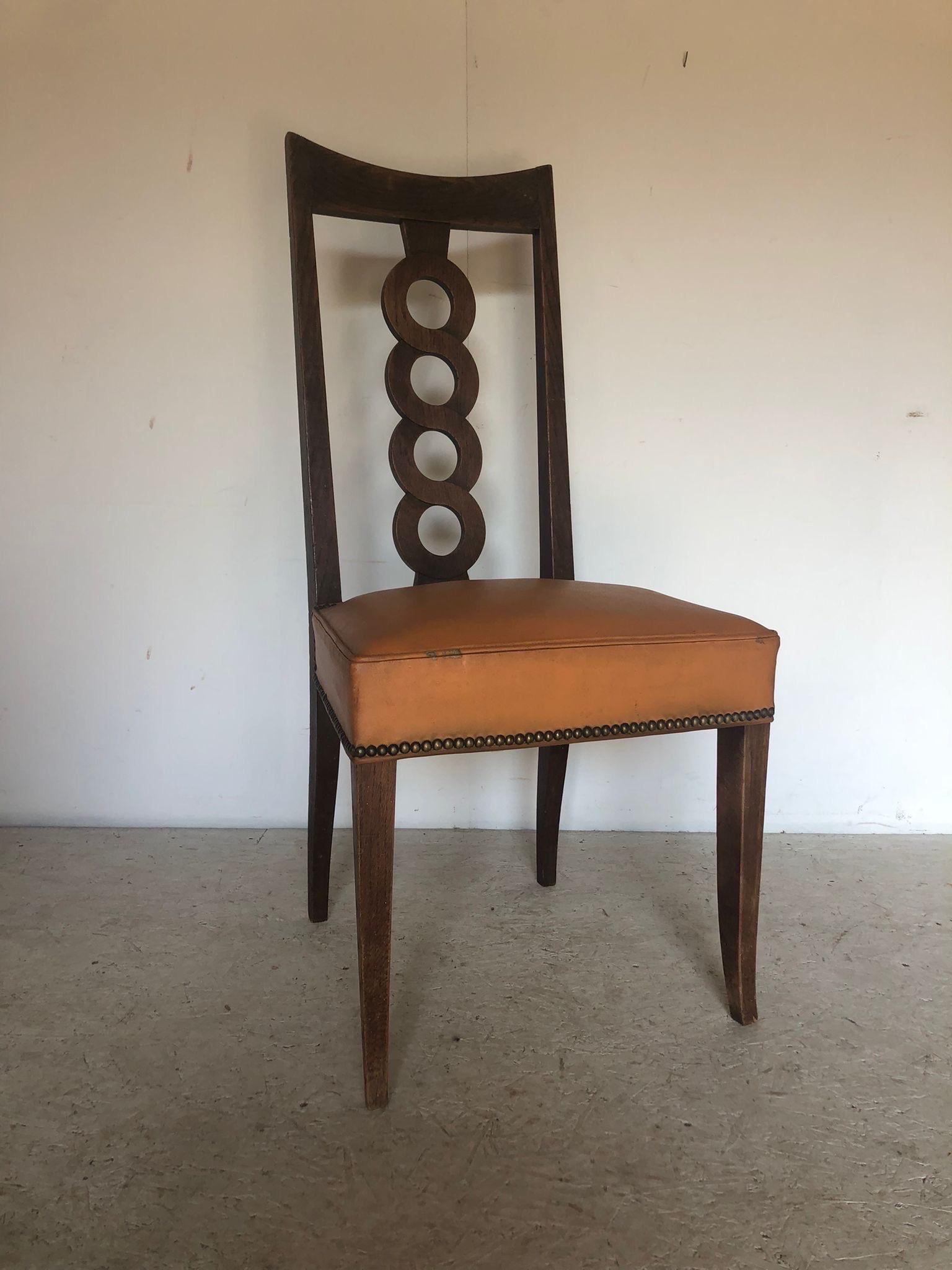 set of four chair by Victor Courtray rare model in oak