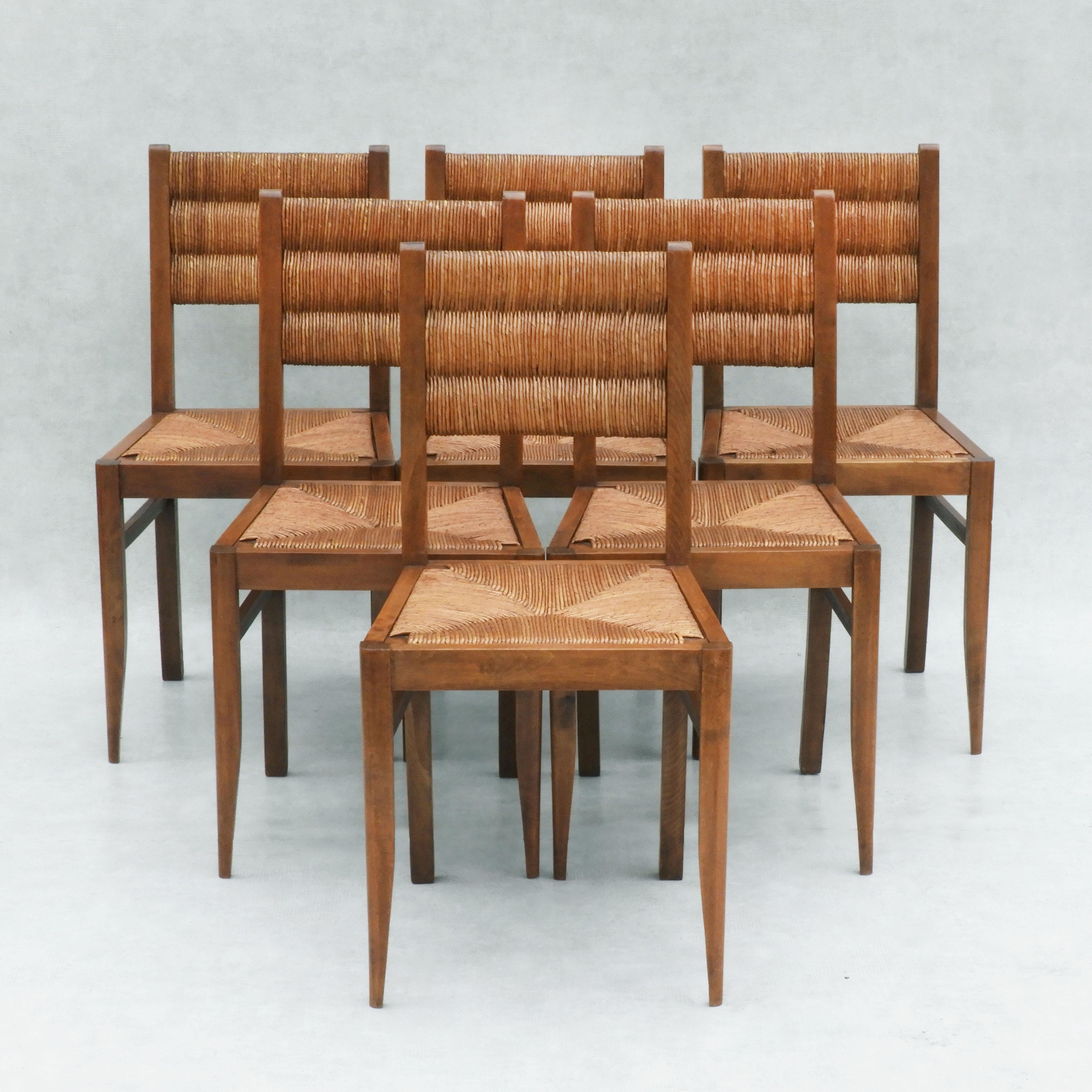 Jonc Chaises de salle à manger de style Victor Courtray en chêne et jonc, C1950 France