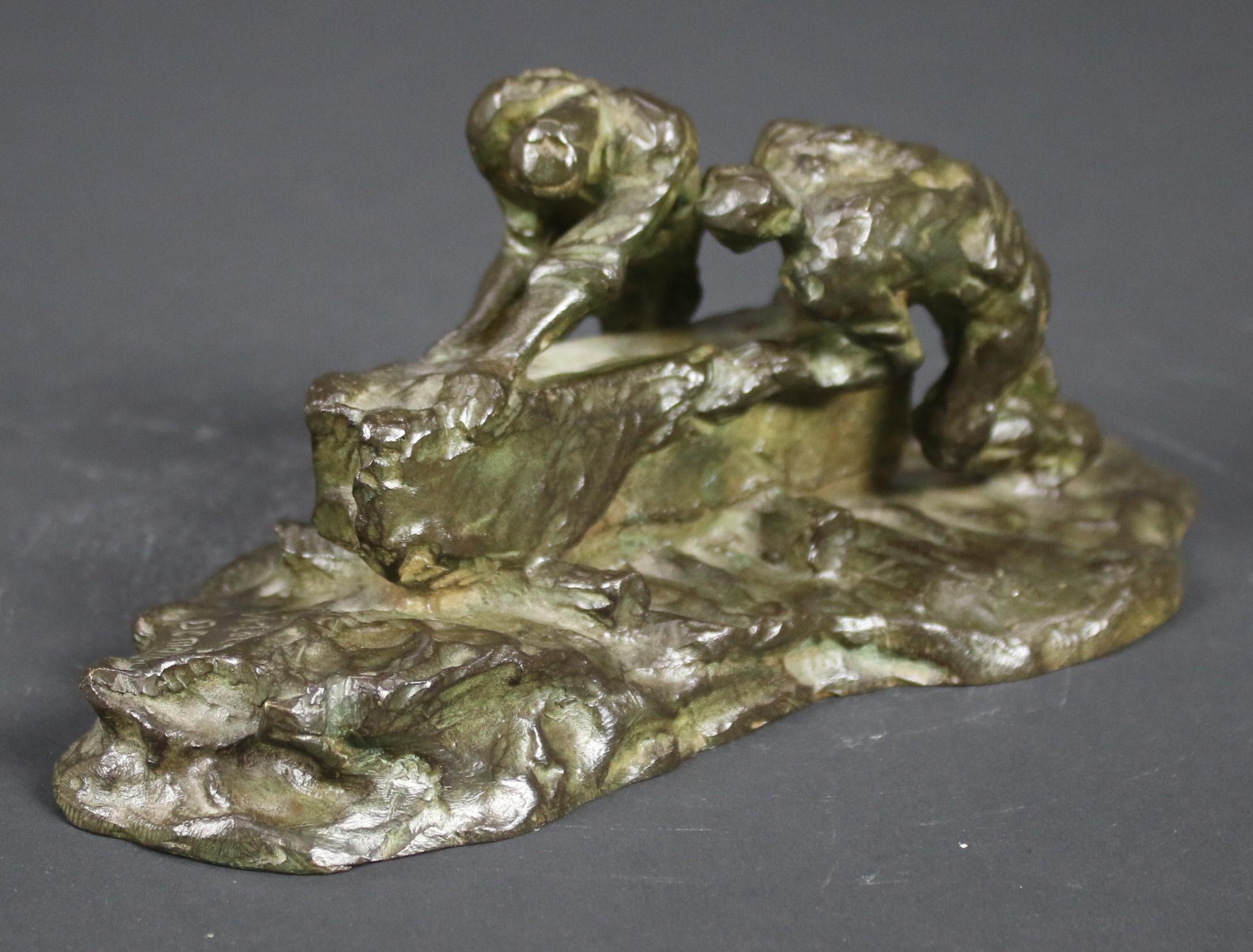 Victor Demanet Figurative Sculpture - Quarrymen rolling a stone.