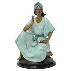 Escultura «Mujer Sentada» de Víctor Gutiérrez, en bronce, prueba de artista, 1989