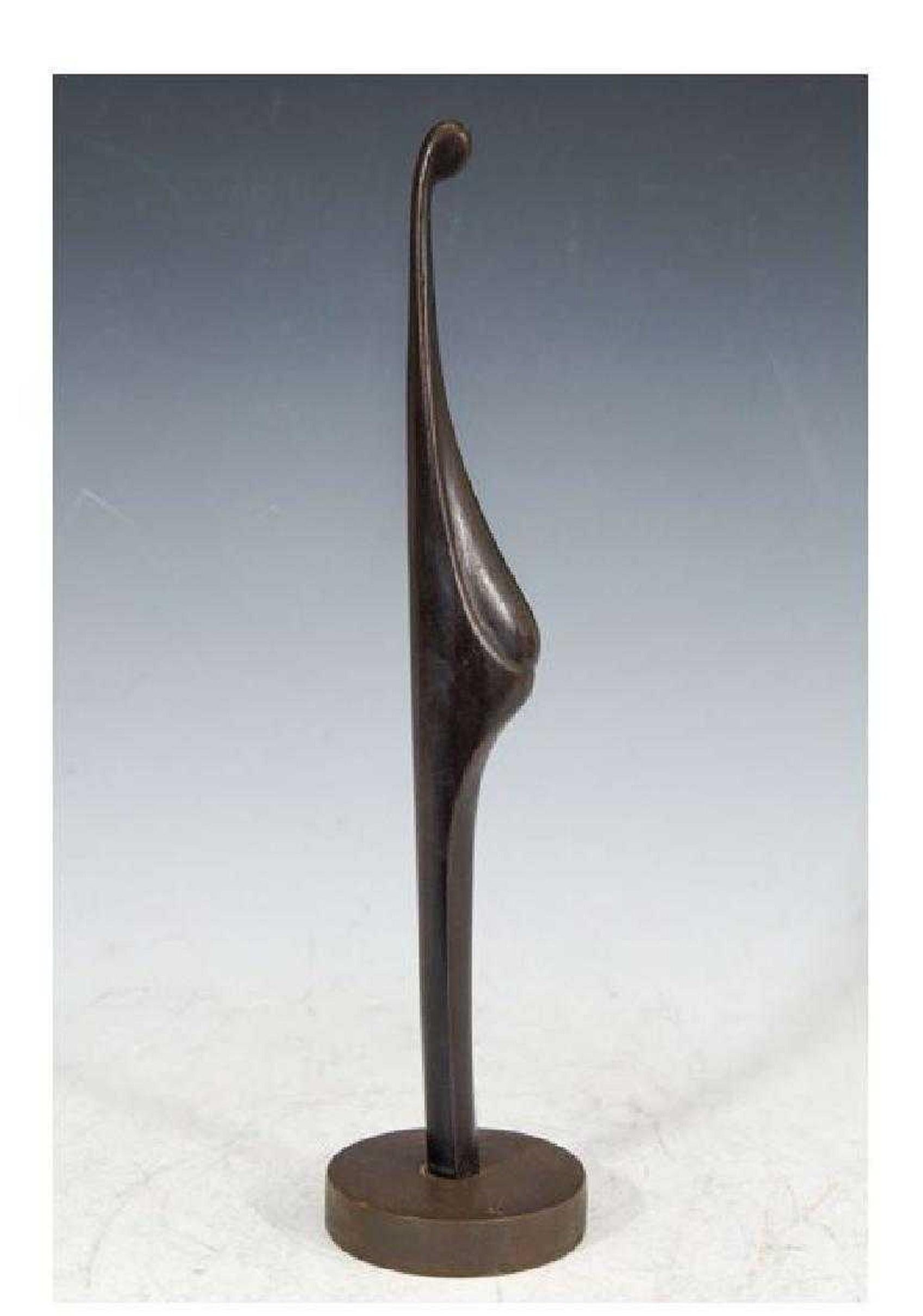 From a limited edition. an abstract elongated art deco form of a mother with child. 
signed on bottom of wooden base and etched into bronze.

Victor Halvani no doubt had an enchanted childhood. A warm loving Jewish family. His father a judge, his