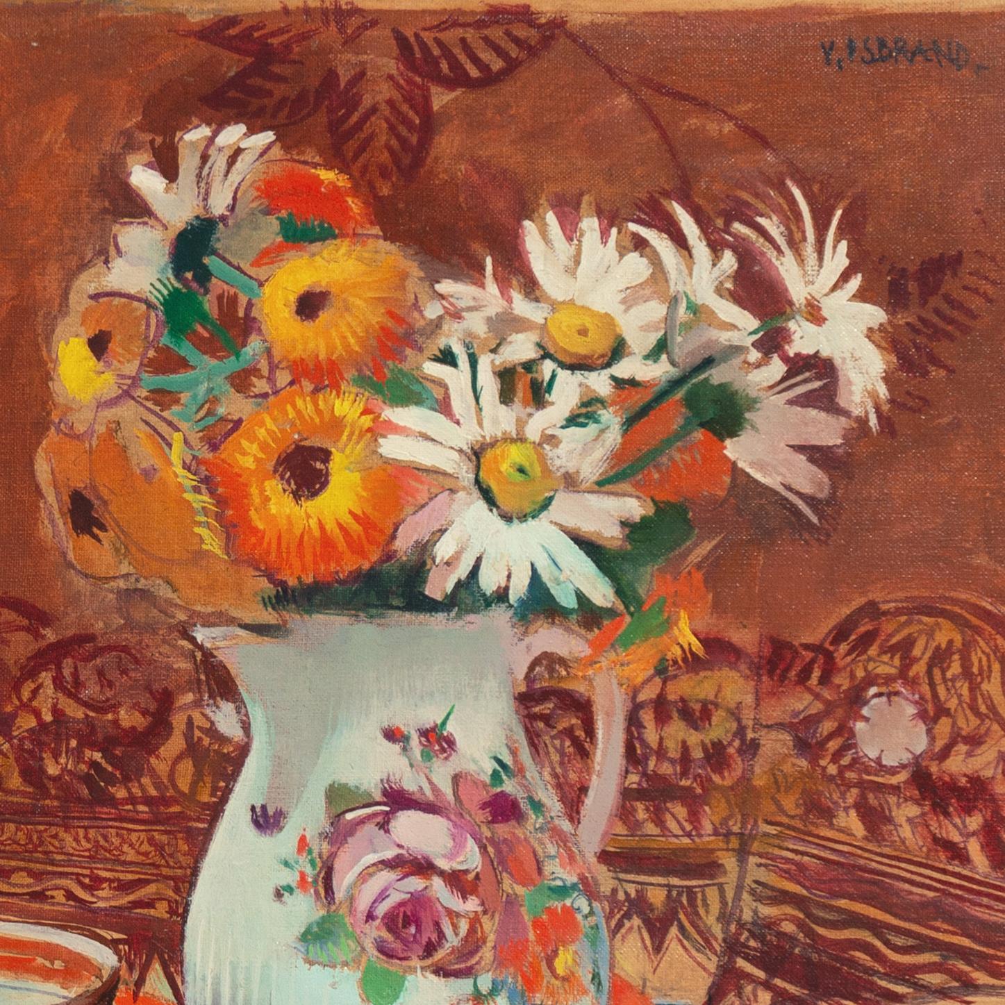 Signed upper right, 'V. Isbrand' for Victor Isbrand (Danish, 1897-1989) and painted circa 1935. 

A vibrant Post-Impressionist still-life showing golden marigolds and white daisies informally arranged in a porcelain jug, set beside a Japanese Imari