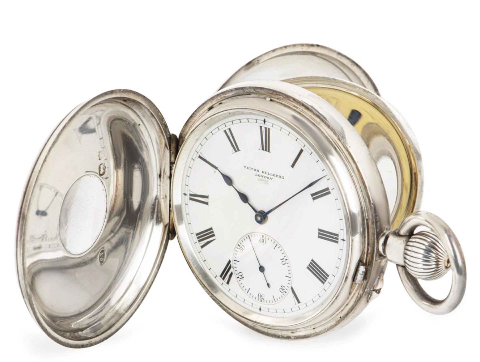 Victor Kullberg London. A Rare Silver Half Hunter Keyless lever Pocket Watch C1890s in an associated Silver Frame pocket watch holder.

Dial: The perfect white enamel dial fully signed and numbered with Roman Numerals outer minute track and