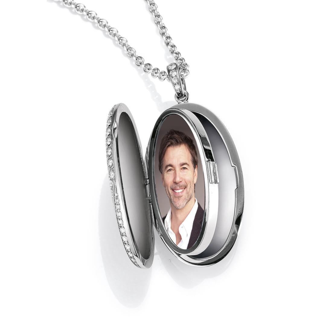 Victor Mayer customizable oval locket pendant 18k white gold, Calima Collection, 155 diamonds, total 1.76 ct, G VS, measurements app. 34.0 mm x 20.0 mm

About the creator Victor Mayer
Victor Mayer is internationally renowned for elegant timeless
