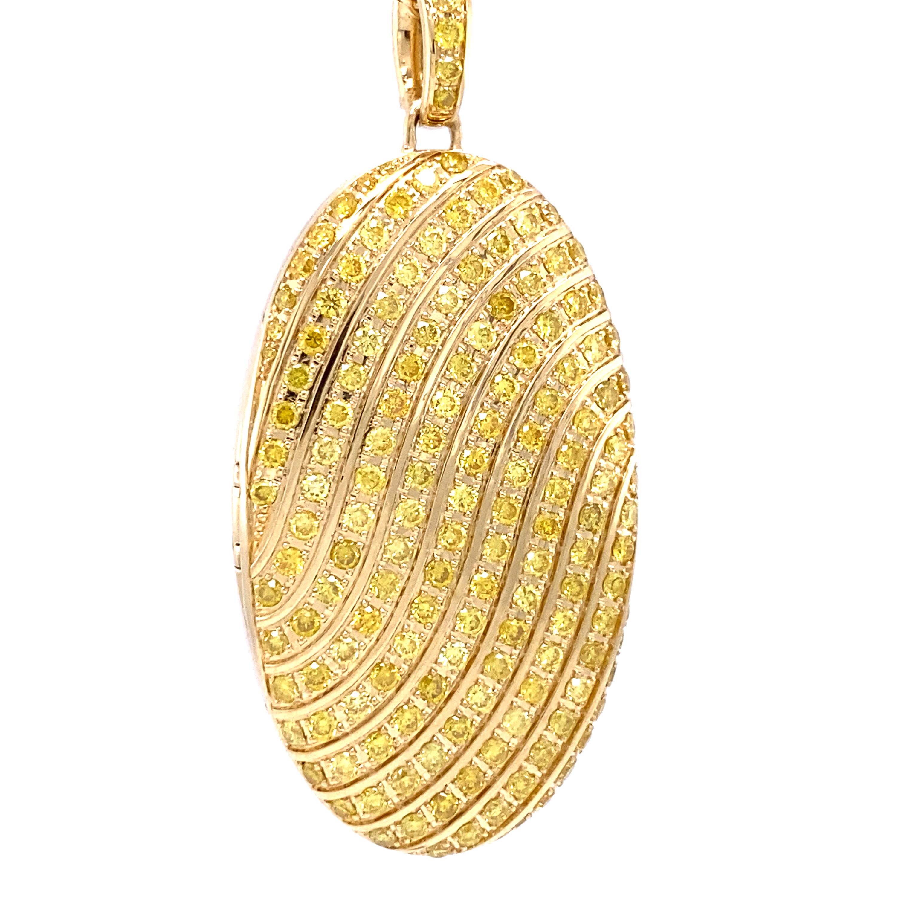 Victor Mayer customizable oval locket pendant 18k yellow gold, Calima Collection, 155 fancy yellow diamonds, total 1.76 ct, G VS measurements app. 34.0 mm x 20.0 mm

About the creator Victor Mayer
Victor Mayer is internationally renowned for elegant