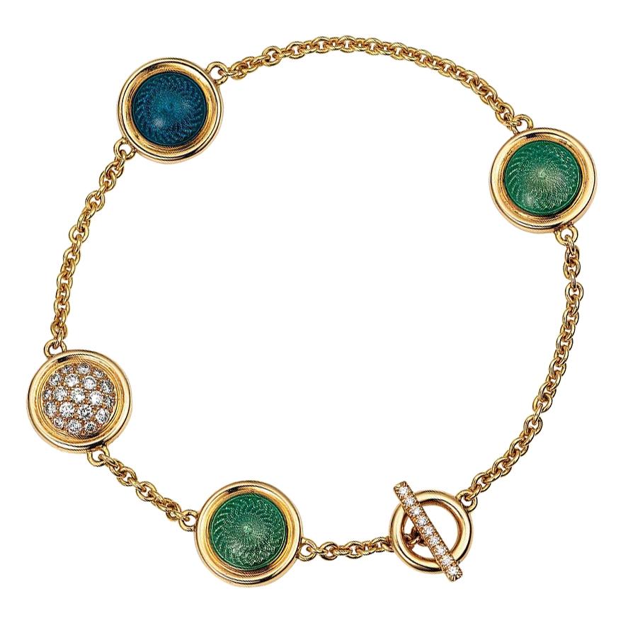 Victor Mayer Bracelet bonbons en or jaune 18 carats avec 28 diamants, turquoise et émail bleu 