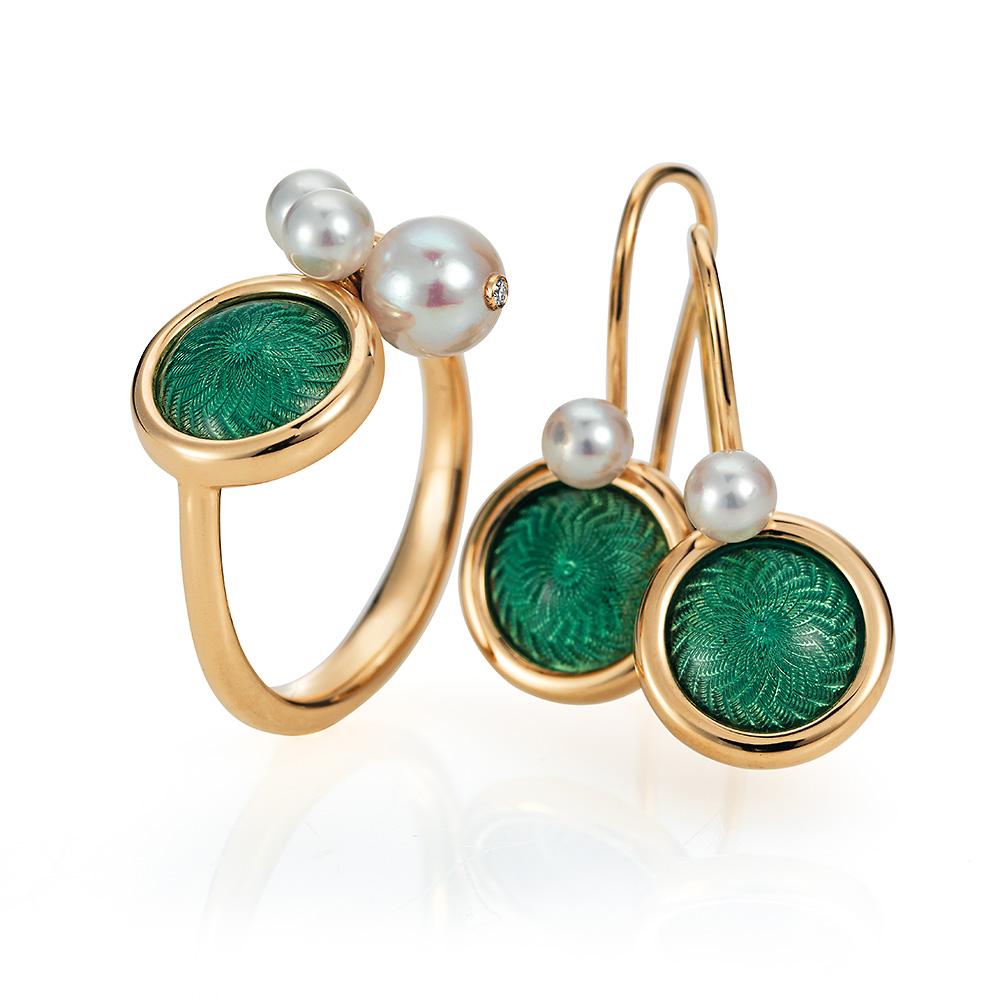 Victor Mayer round dangle earrings 18k yellow gold, Candy collection, translucent light turquoise vitreous enamel, guilloche, 2 akoya pearls, diameter with eyelet app. 11.6 mm x 24.8 mm

About the creator Victor Mayer 
Victor Mayer is