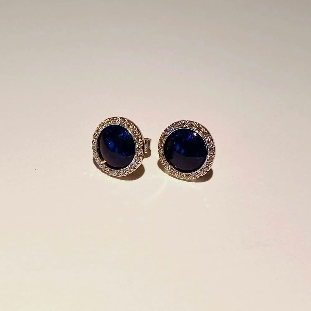 Victor Mayer rund stud earrings 18k white gold, Candy collection, translucent petrol blue vitreous enamel, guilloche, 48 diamonds, total 0,30 ct, G VS, diameter app. 12.2 mm

About the creator Victor Mayer 
Victor Mayer is internationally renowned