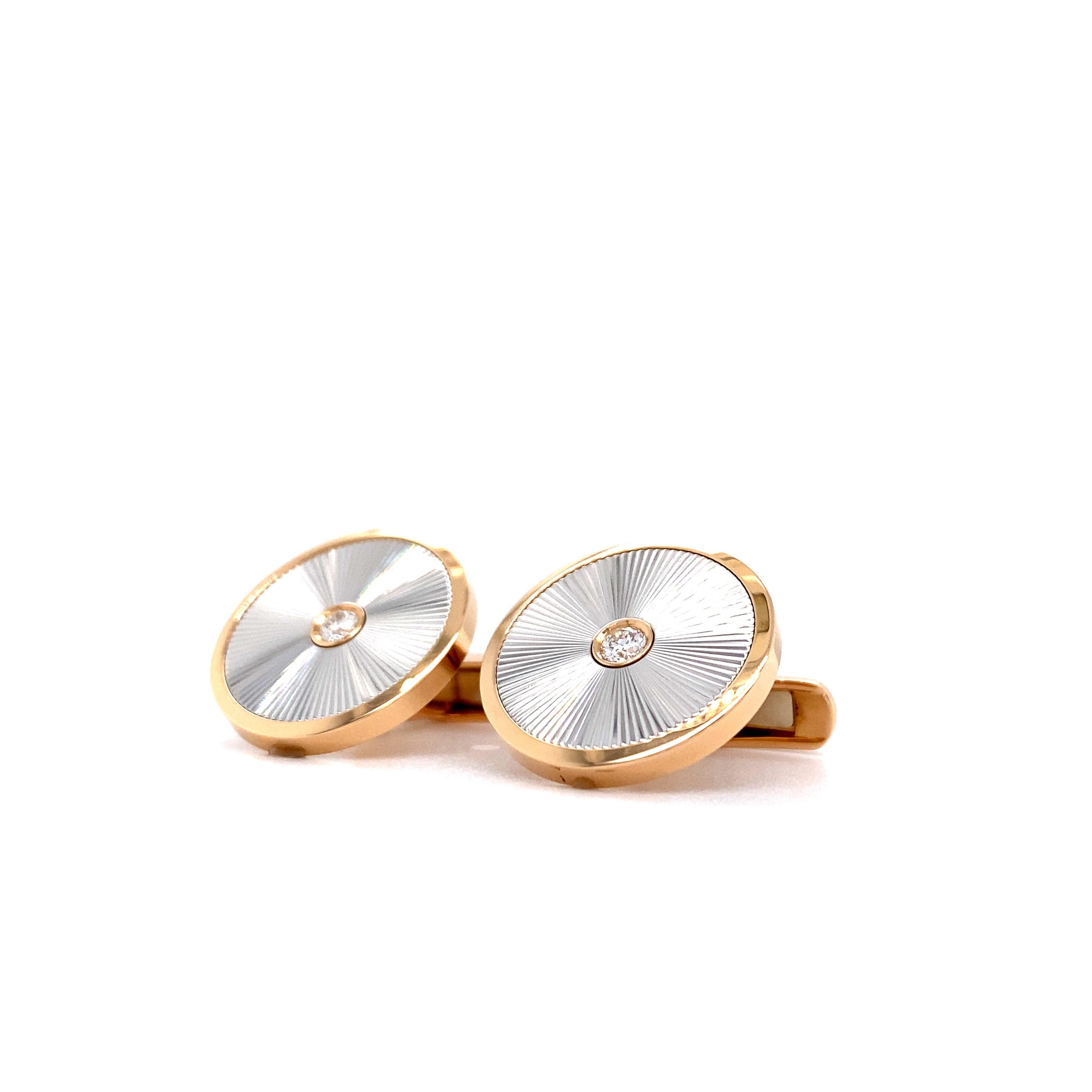 Starburst limited edition round cufflinks in rose gold & white gold with diamonds 

Cuff links, 750/- RG/WG, 2 diamonds total 0.20 ct, G VS
Reference: V1611/00/00/10C
Material: 750/- rose gold/white gold
Diamonds: 2 diamonds total 0.20 ct, G