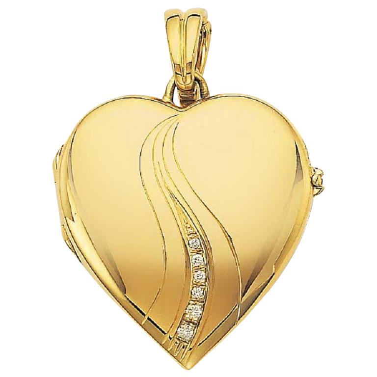 Médaillon pendentif en forme de cœur poli en or jaune 18 carats avec 7 diamants 0,09 carat H VS, 28 x 32 mm