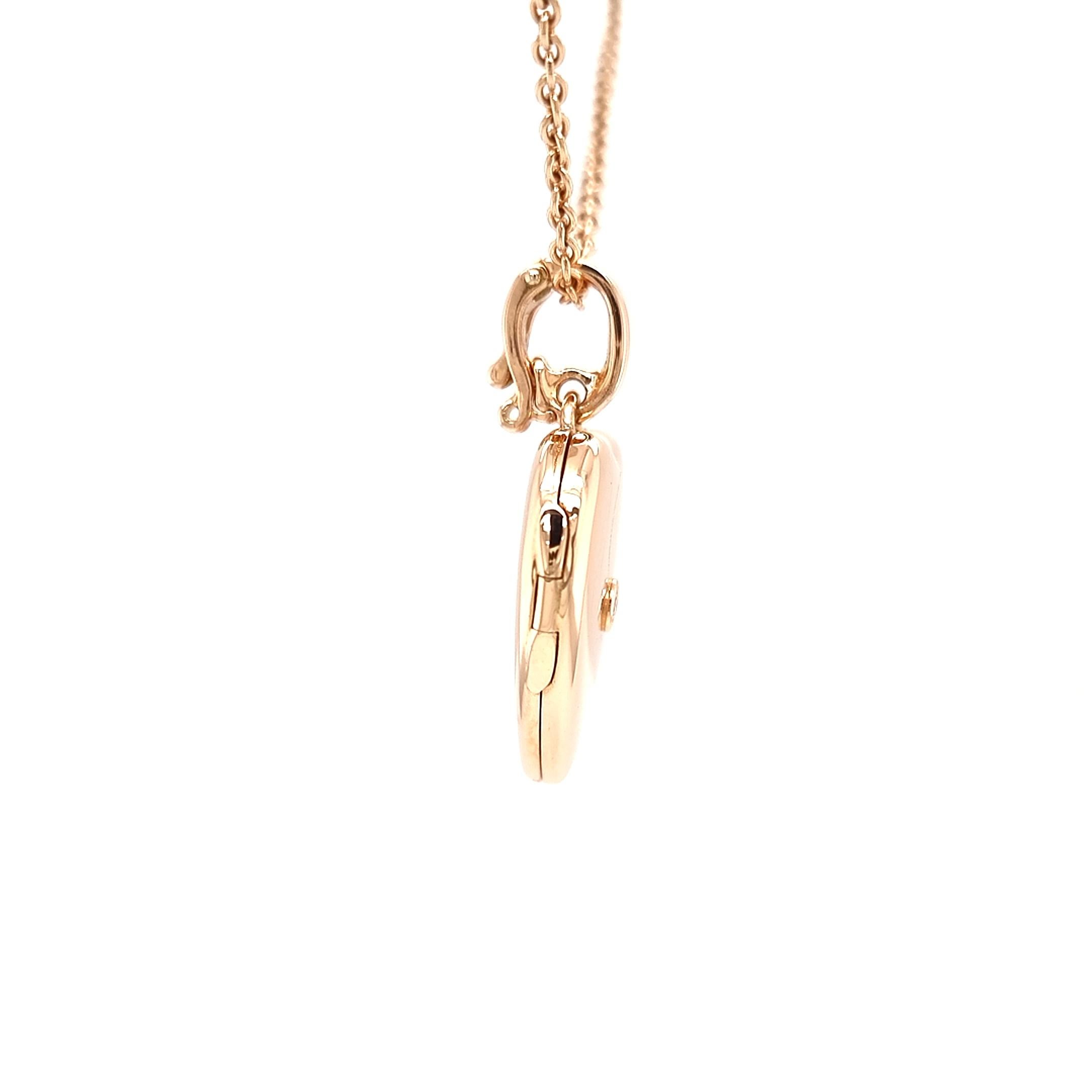 gold heart-shaped h pendant