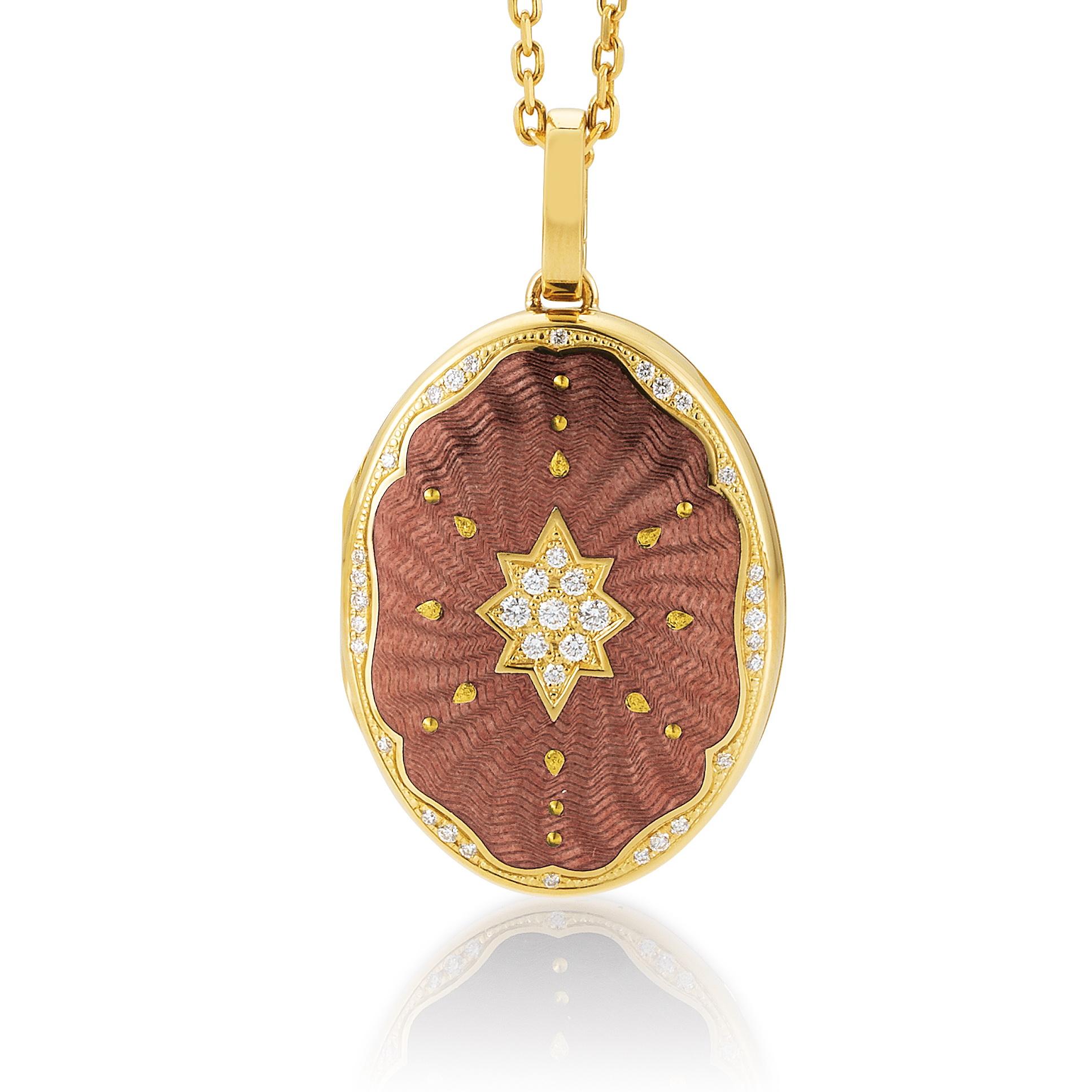 Victor Mayer oval locket pendant 18k yellow gold, Victoria collection, translucent dusky pink vitreous enamel, gold paillons, 37 diamonds, total 0.29 ct, G VS, brilliant cut, measurements app. 25 mm x 35 mm

About the creator Victor Mayer
Victor