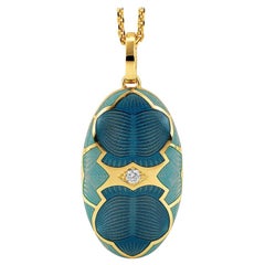 Collier pendentif médaillon ovale en or jaune 18 carats, émail bleu/turquoise et diamant 0,1 carat