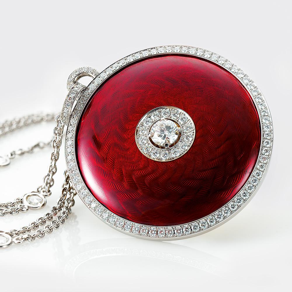 Victor Mayer round pendant 18k white and yellow gold, Opera Collection, aubergine red vitreous enamel, 138 diamonds, total 4.98 ct, G VS, brilliant cut, diameter app. 48.0 mm

About the creator Victor Mayer
Victor Mayer is internationally renowned