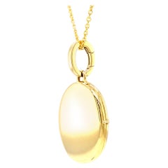 Oval 18k Yellow Gold High Polish Locket for Two Pictures 23 x 20 mm
