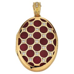 Médaillon pendentif ovale en or jaune 18 carats, émail rouge aubergine et 20 diamants 0,37 carat H VS