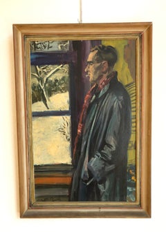 Hombre delante de la ventana