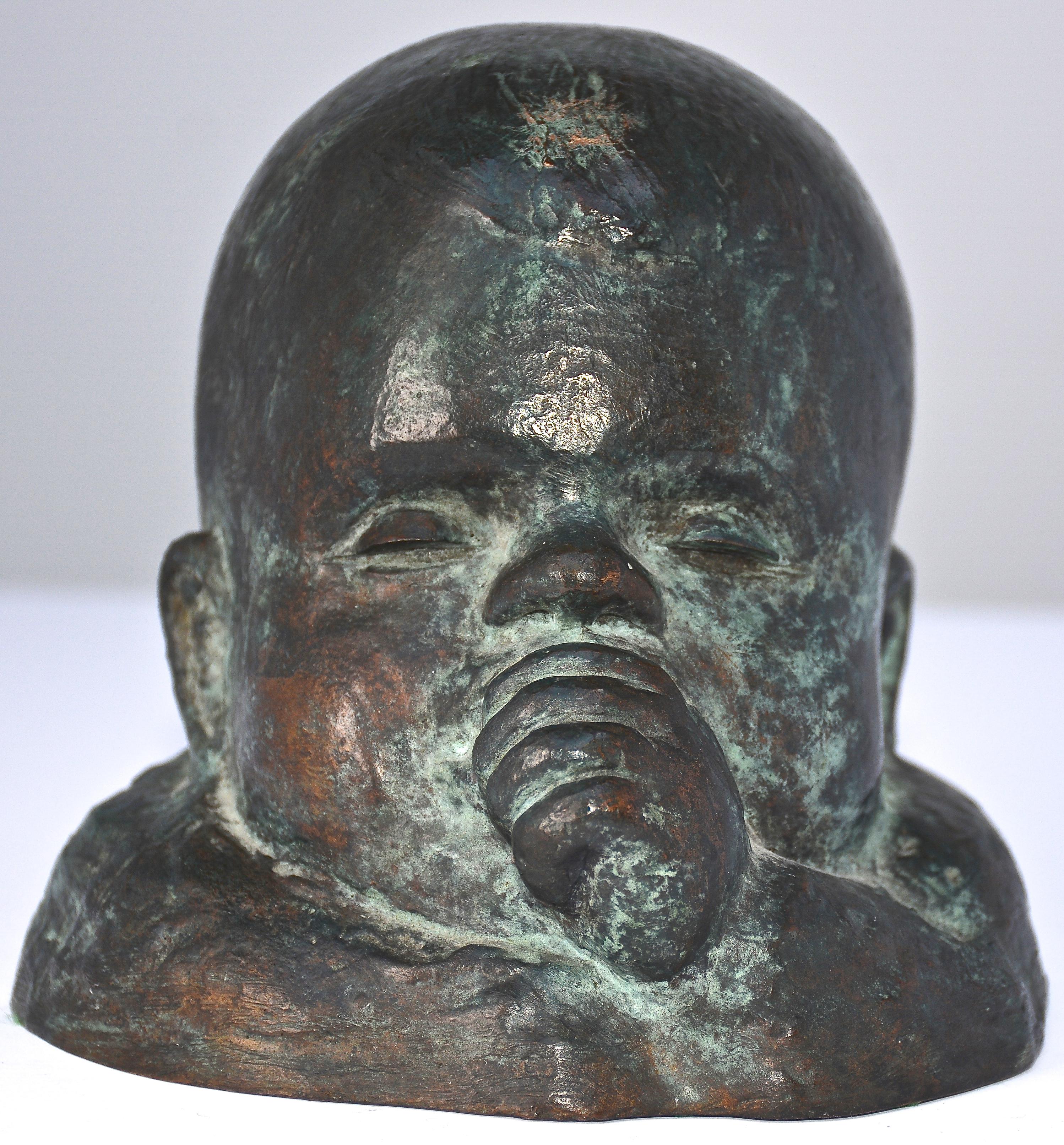 Buste d'un jeune enfant en bronze signé Victor Salmones