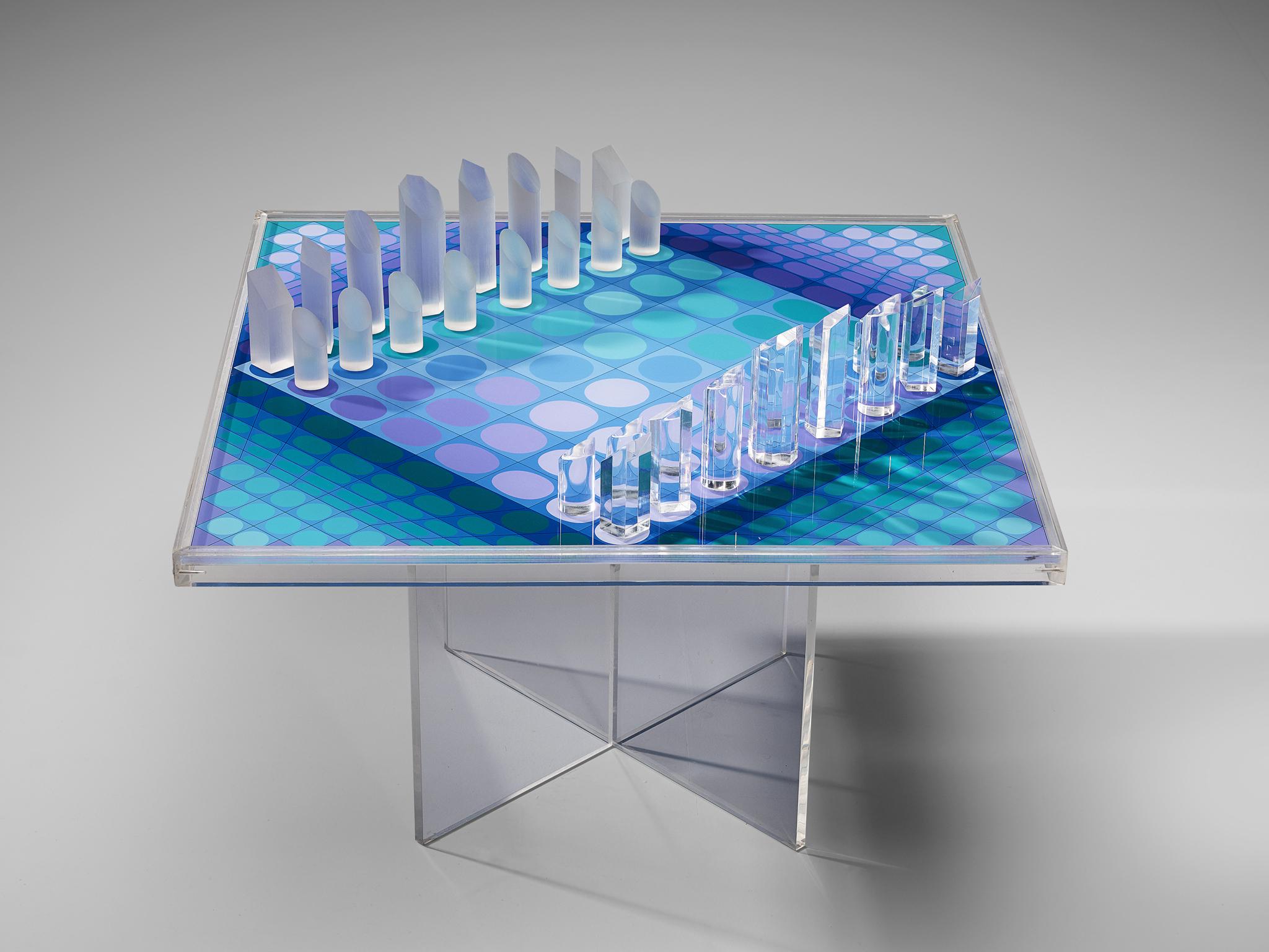 Victor Vasarely, chess set, plexiglass, France, 1979

Victor Vasarely (1906-1997), one of the important artists of the optical art, designed this chess set in 1979. On a cross-legged plexiglass base rests the squared chess board with 32 pieces. A