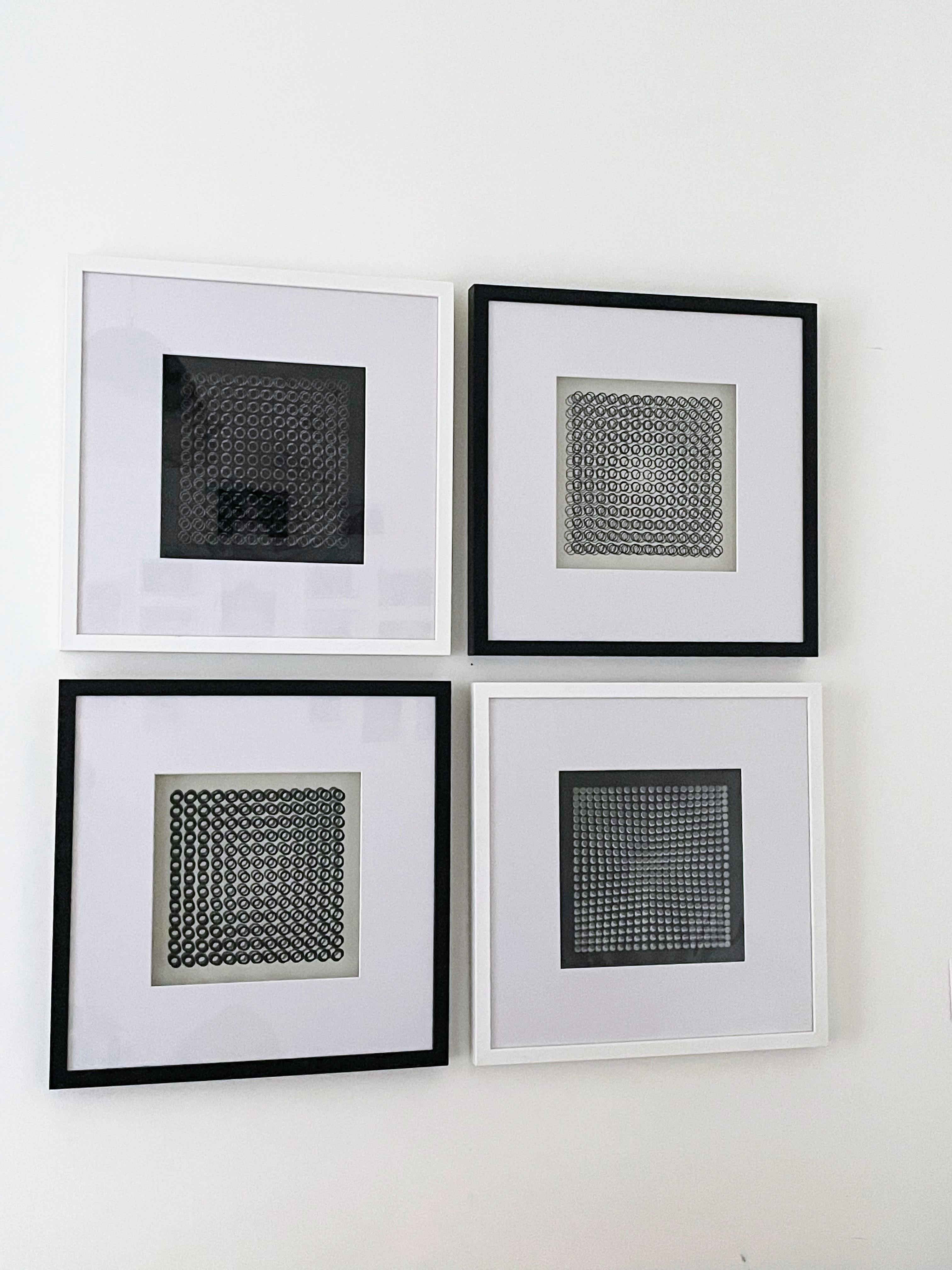 Vasarely prints: OEUVRES PROFONDES.
 Four different op art prints by Victor Vasarely, from his ‘Oeuvres Profondes’ series.
 Editions Du Griffon Neuchâtel, 1973. 
Matt window is 10 inches by 10 inches. 
Serigraphs on a transparent film. 
