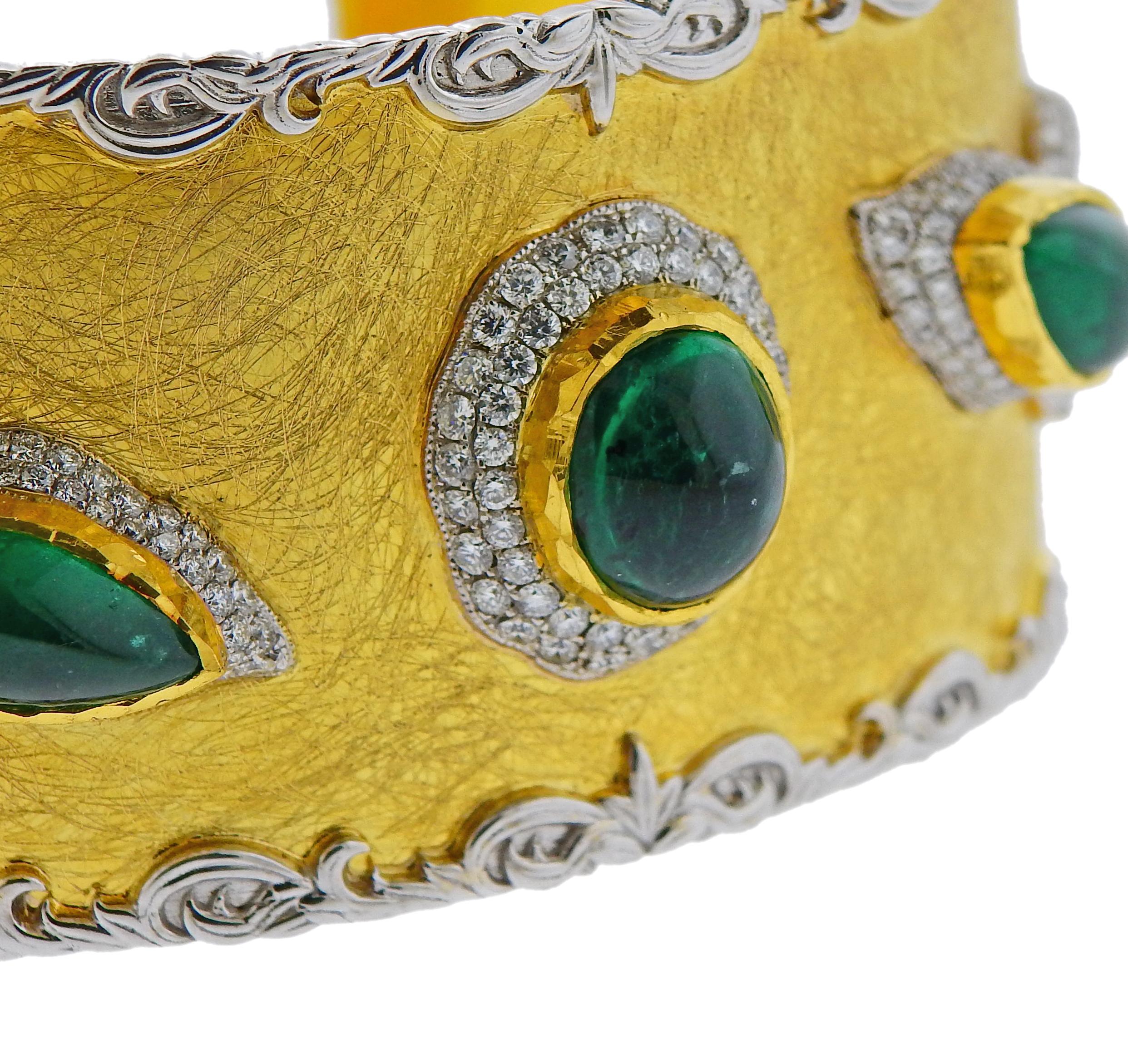 Impressive 18k and 24k gold cuff bracelet by Victor Velyan, set with emerald cabochons and approx. 1.80ctw in diamonds. Approximate retail is $68000. Bracelet will fit approx. 7.5