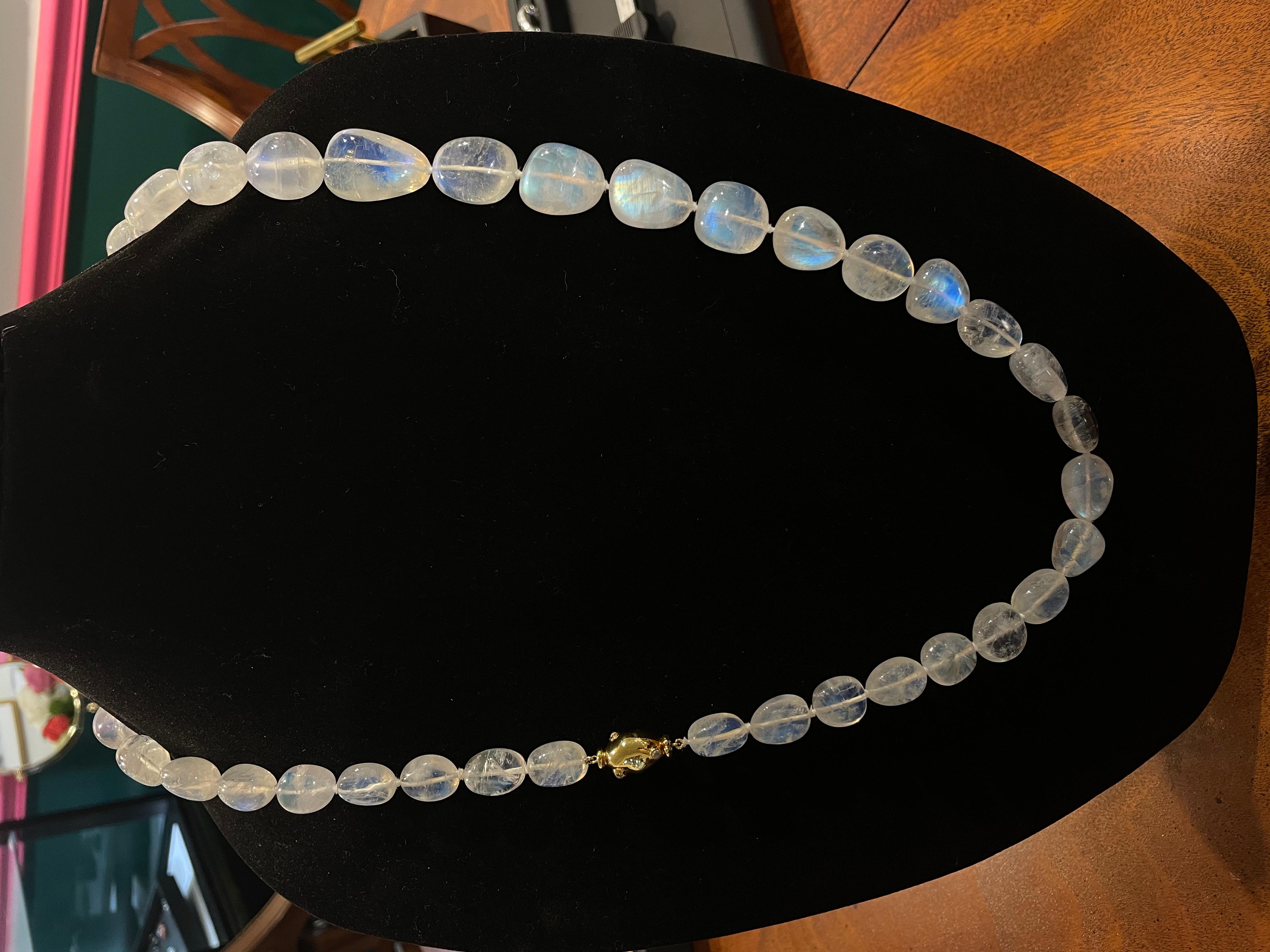 40 stunning moonstone beads strung and individually knotted with the an exceptional 14kt yellow gold clasp with moonstone accents. This is a one of a kind Victor Velyan creation.