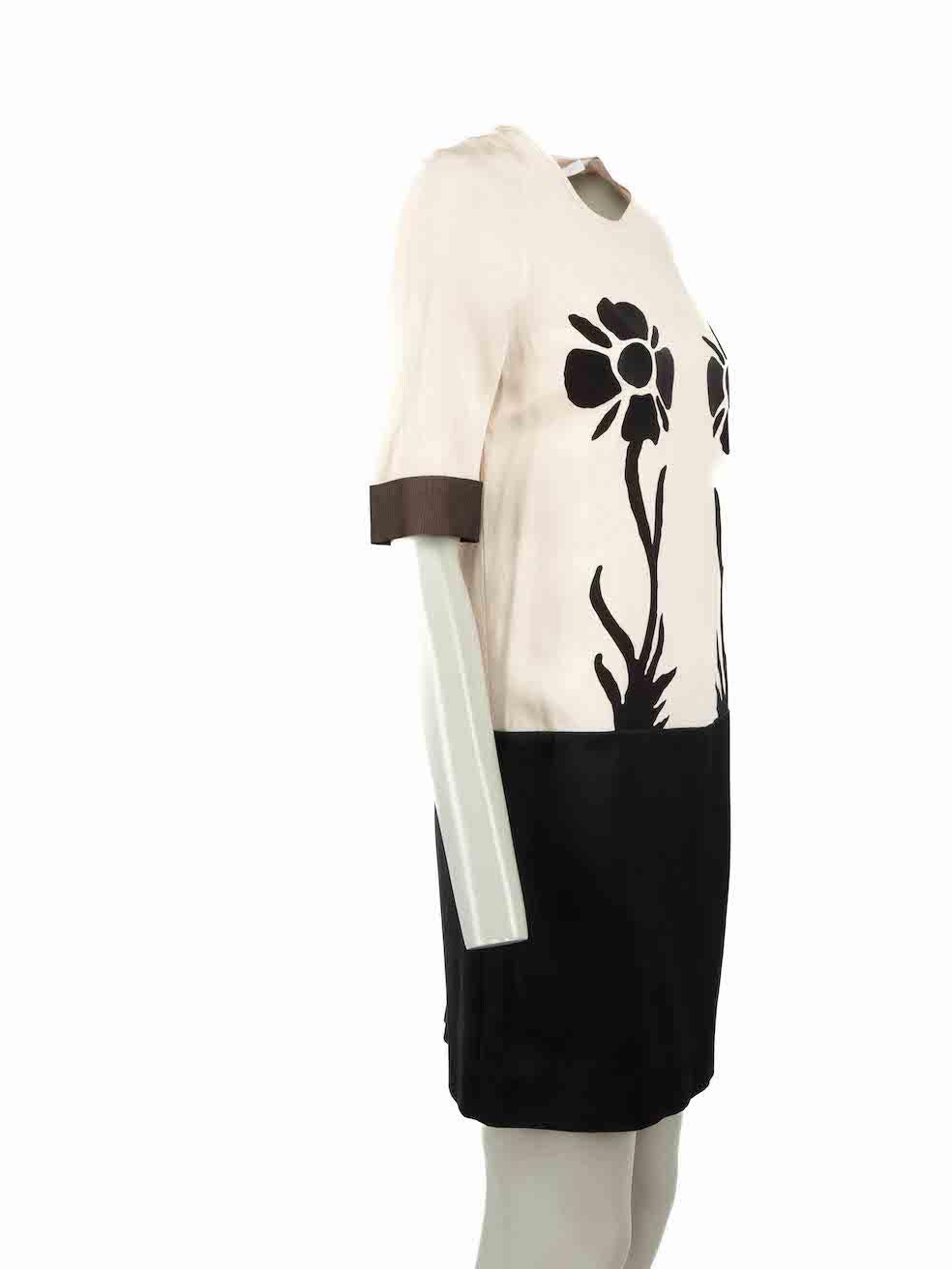 CONDITION is Very good. Minimal wear to dress is evident. Pluck to the weave of the front skirt on this used Victoria Victoria Beckham designer resale item.

Details
Beige
Synthetic
Dress
Black floral appliqu√©
Knee length
Round neck
Back zip and