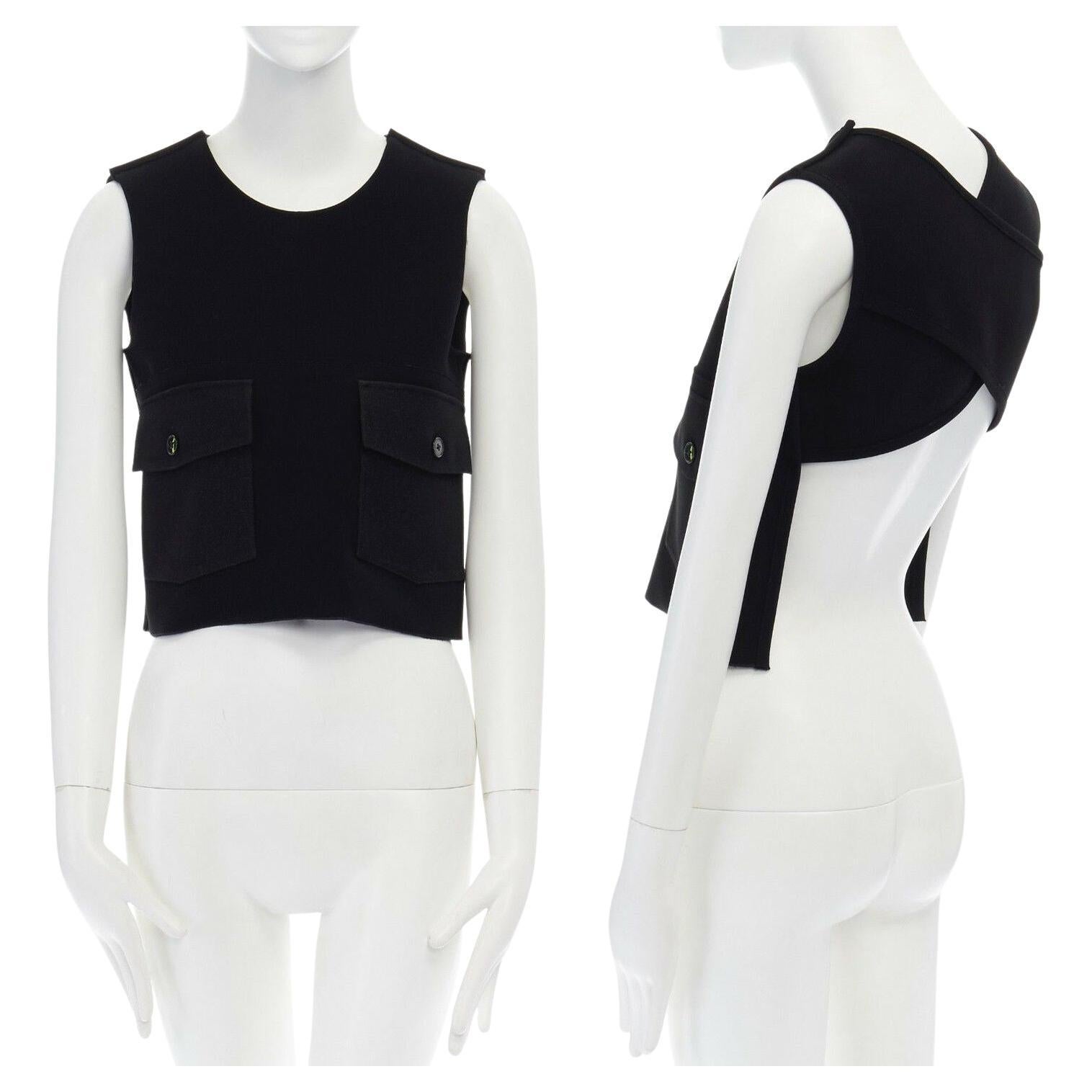 VICTORIA BECKHAM black crepe dual cargo pocket cross strap open back crop top S Reference: LNKO/A00892 
Brand: Victoria Beckham 
Designer: Victoria Beckham 
Material: Silk 
Color: Black 
Pattern: Solid 
Extra Detail: Black crepe. Dual flap front