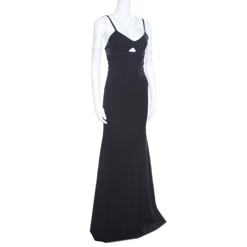 Statement silhouette and timeless hue combine to make this maxi dress from Victoria Beckham a worthy closet investment. It is cut from a blend of wool and silk and is styled with a cutout detail at the bodice, slender shoulder straps and zip