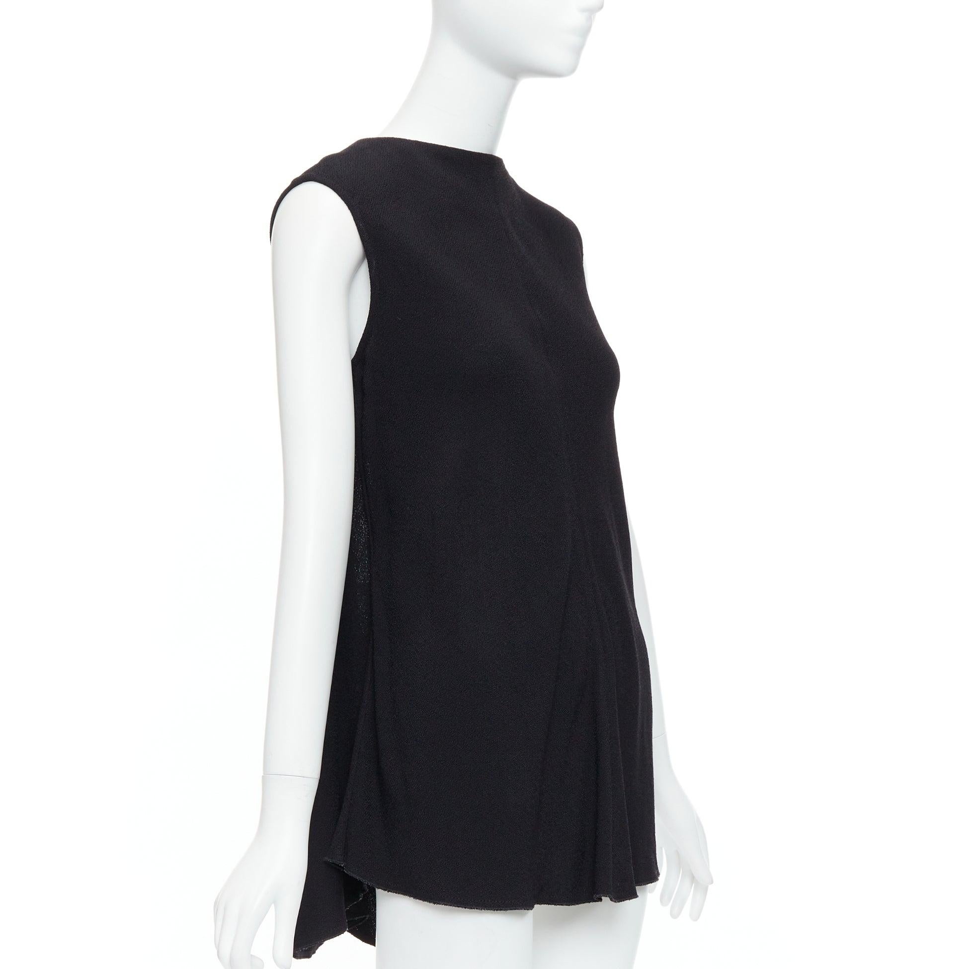 VICTORIA BECKHAM black drape backless inserted belt crew neck top
Reference: YIKK/A00140
Brand: Victoria Beckham
Material: Fabric
Color: Black
Pattern: Solid
Closure: Belt
Extra Details: Inserted back belt.
Made in: England

CONDITION:
Condition: