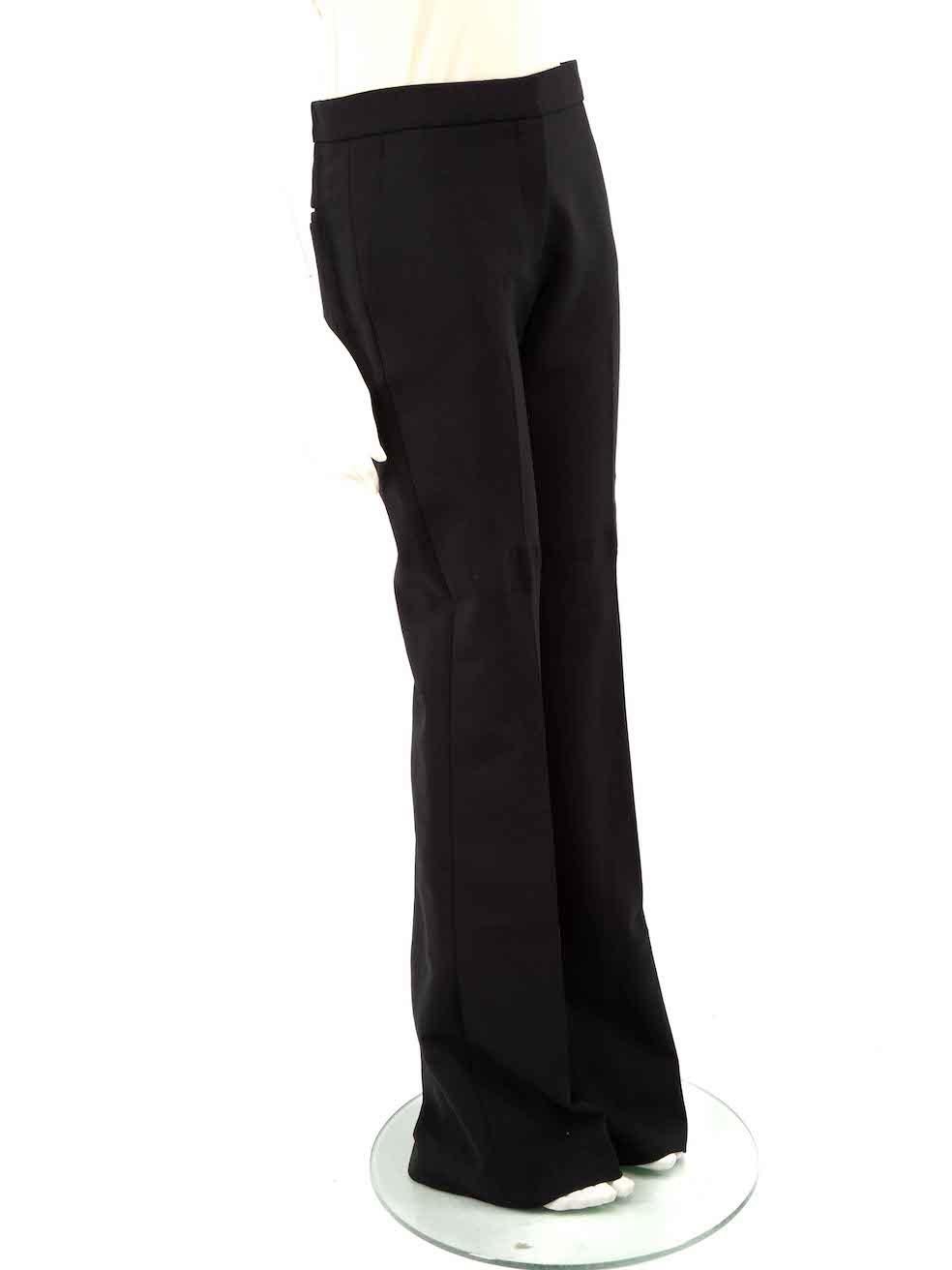 CONDITION is Very good. Minimal wear to trousers is evident. Minimal wear to the right leg backside with a pull to weave. No brand label on this used Victoria Beckham designer resale item.
 
 
 
 Details
 
 
 Black
 
 Wool
 
 Flared trousers
 
 Mid