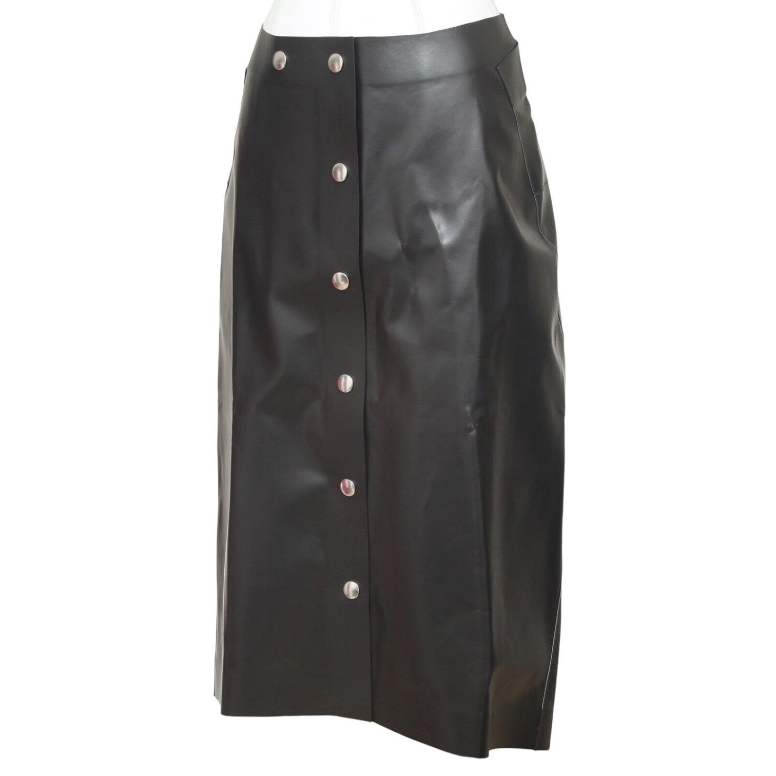 GUARANTEED AUTHENTIC VICTORIA BECKHAM BLACK LEATHER SKIRT BNWT

Retail excluding sales taxes $1,990

Design:
- Black leather mid length skirt.
- Higher waisted.
- Silver-tone front snap closure.
- Slightly longer in the back.
- Beautiful!

Fabric: