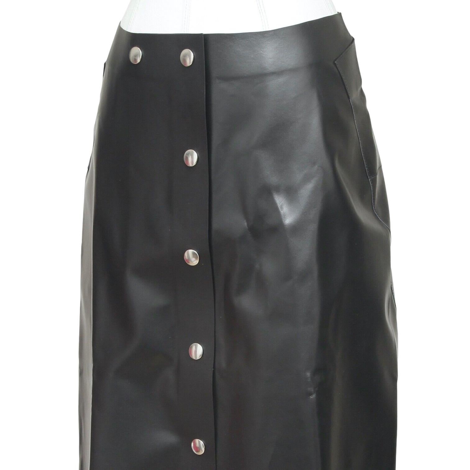 mid-length black leather skirt
